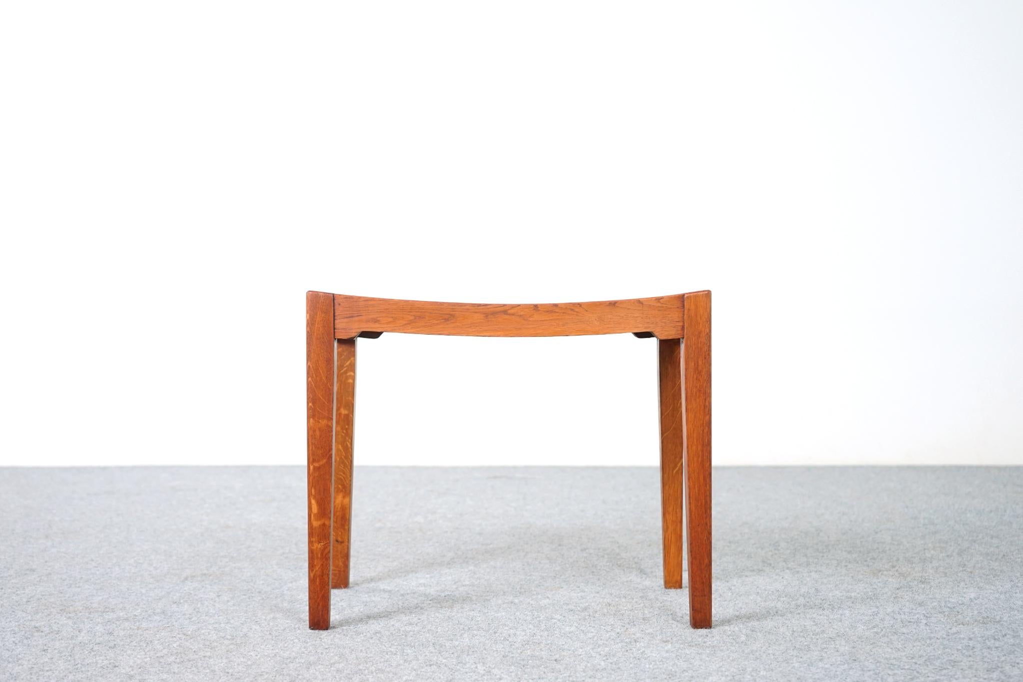 Oak Danish arched stool / side table, circa 1960's. Compact design can be used with virtually any seating type, easy to move around the home. Nice minimal footprint, pop it by your front door, ideal shoe tying bench or sweet side table. Versatile,