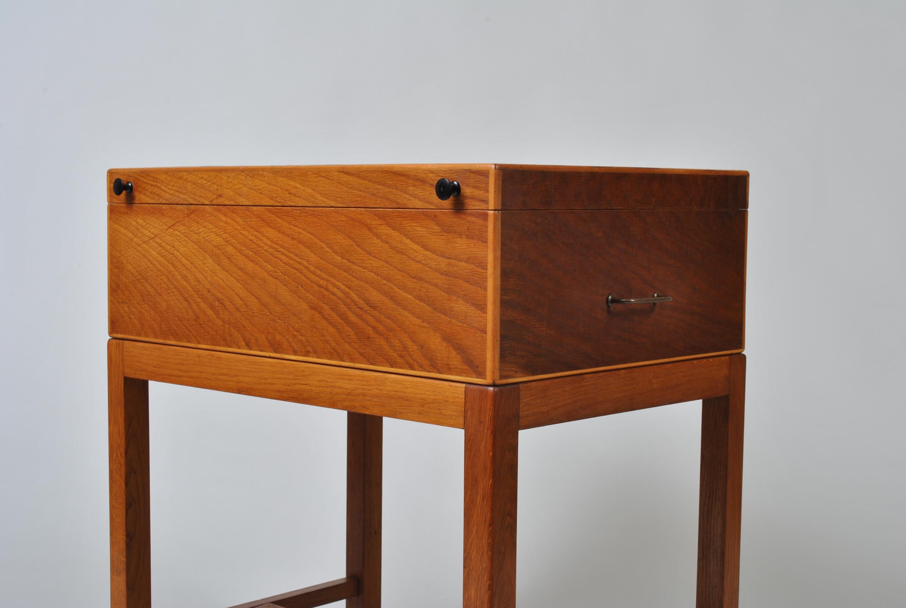 A rather unusual handcrafted oak box table. Danish, circa 1940-1950. Maple interior with removable compartment trays & storage beneath. Burr oak veneered top surface. Charming and practical hobby box or end/side/console table. 