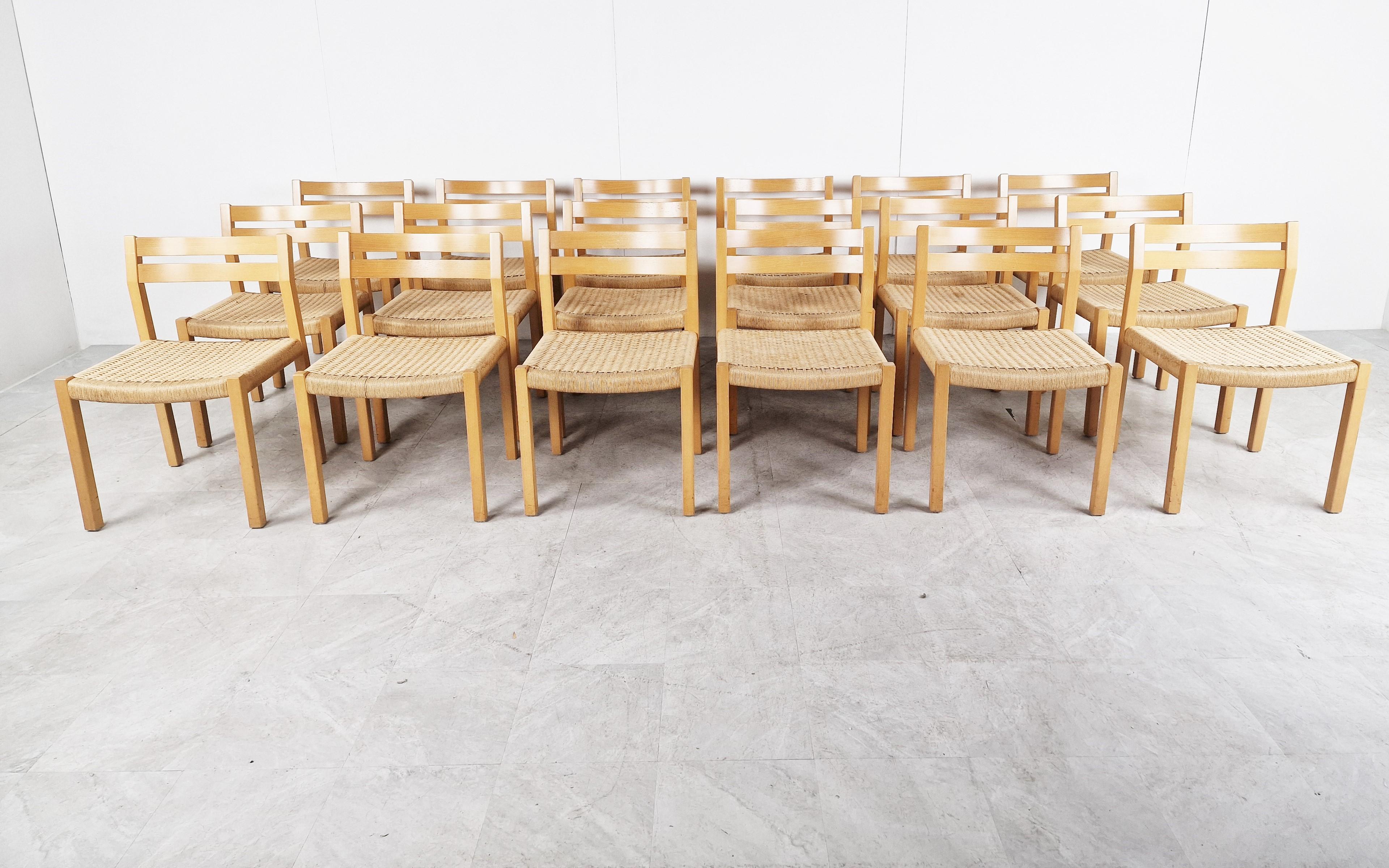 Elegantly shaped set of 14 dining chairs designed by Niels Otto Moller for Moller Mobelfabrik.

Beautiful shaped oak frames with original papercord seats.

Good original condition.

1970s Denmark

Measures: Height: 80cm/31.49