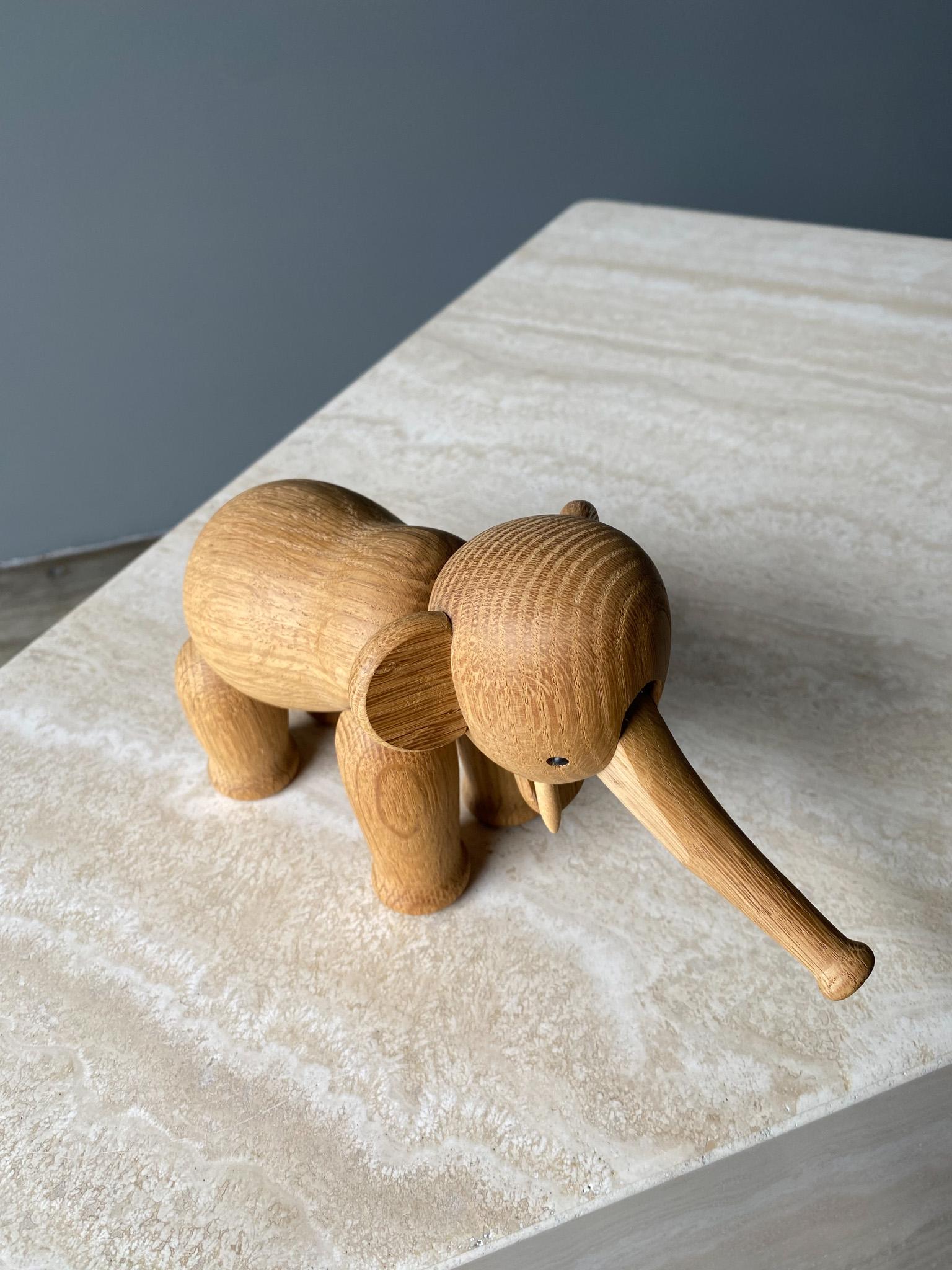 Danish Oak Elephant by Kay Bojensen, articulating arms, legs and trunk. Excellent condition.