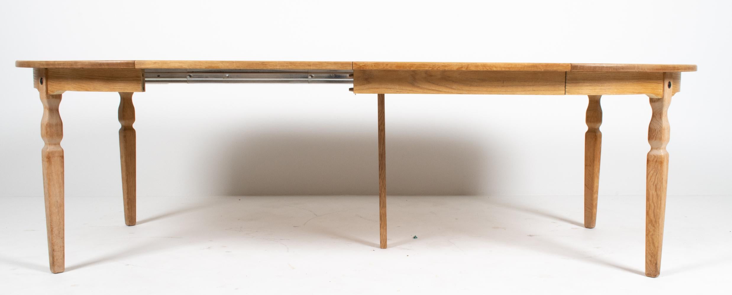 Danish Oak Extension Dining Table in the Style of Henning Kjærnulf For Sale 7