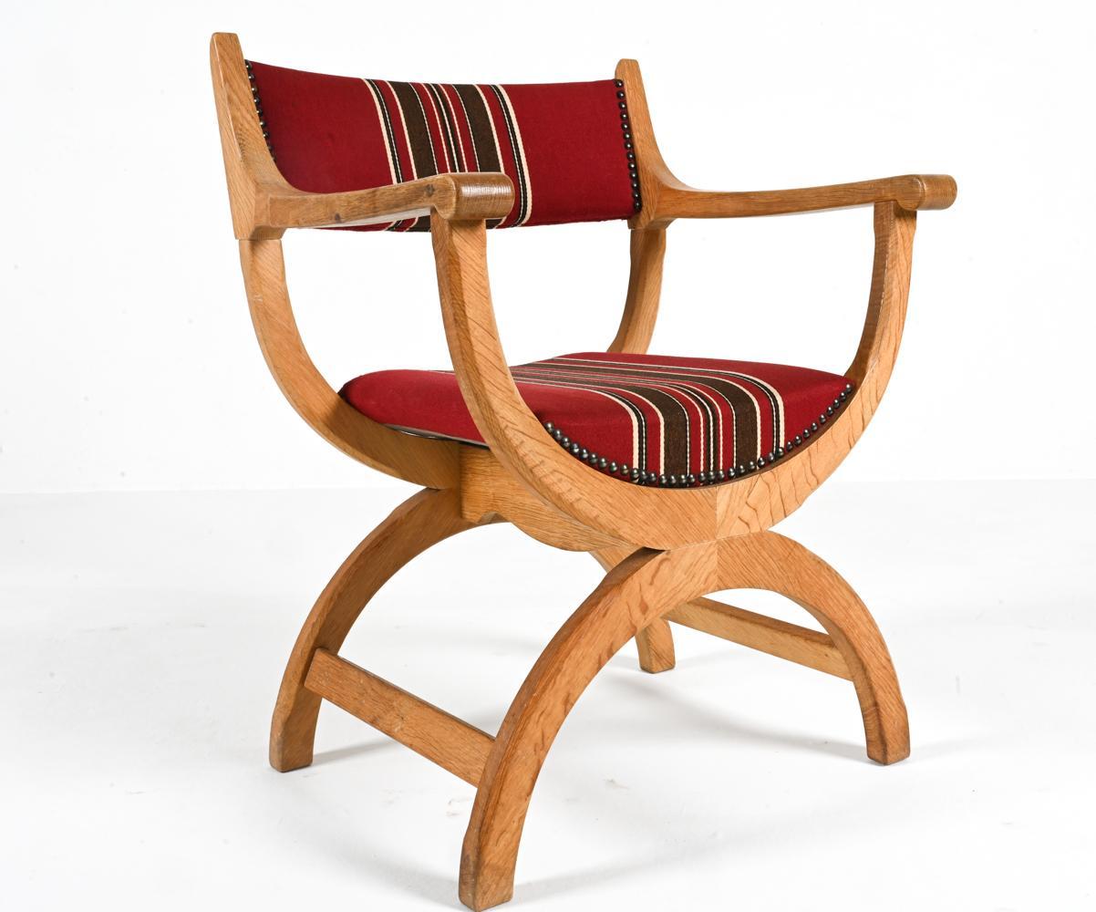 Popularized by the Ancient Romans, the curule seat has long been regarded as a symbol of military and political power. 

Henning Kjærnulf's iconic 'Kurul' chair is a modern take on this classical silhouette, with sculptural curves and clean,