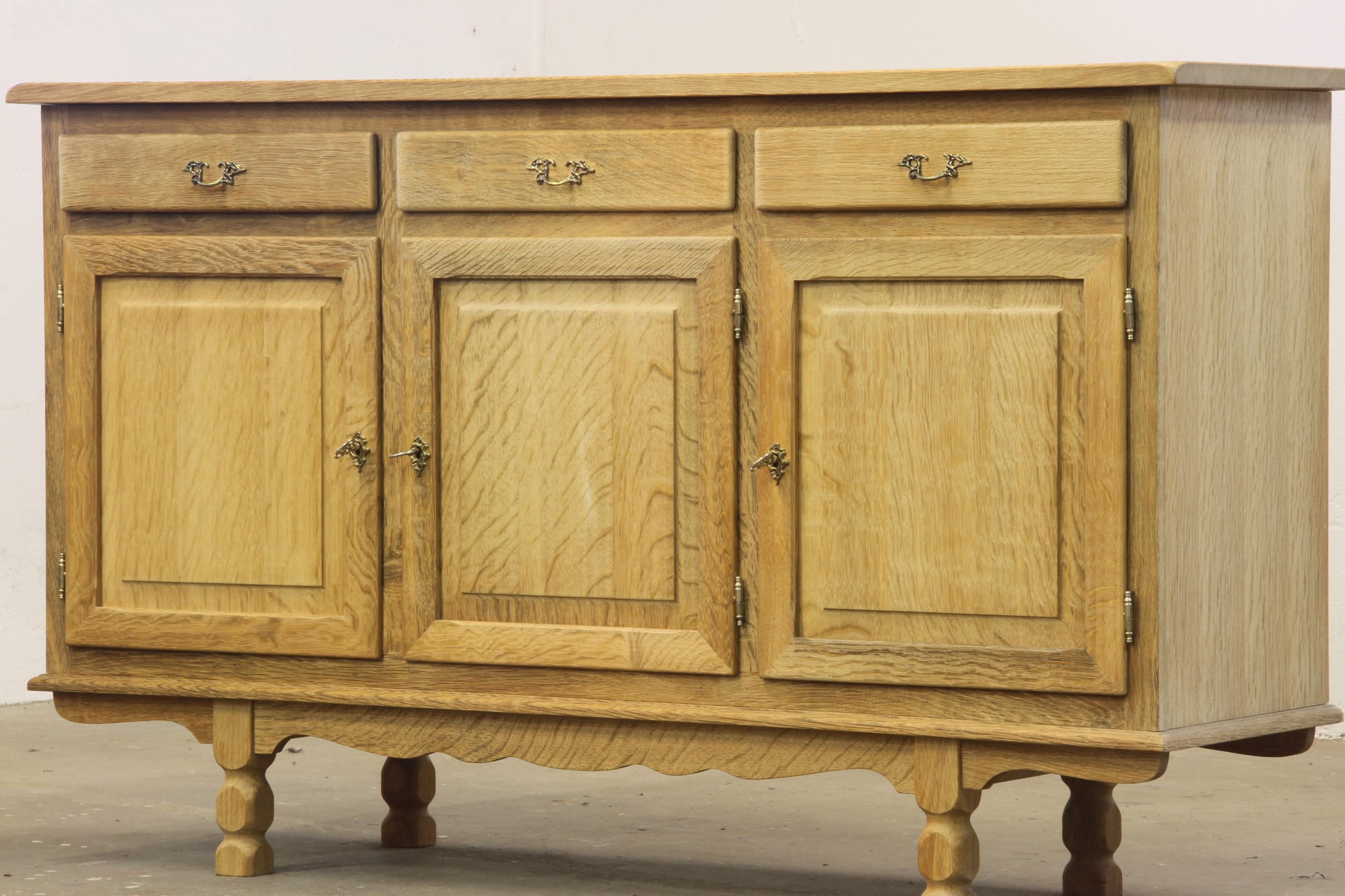 Mid-Century Modern Danish Oak Low Cabinet, Sideboard in the style of Henning Kjærnulf, 1970s For Sale