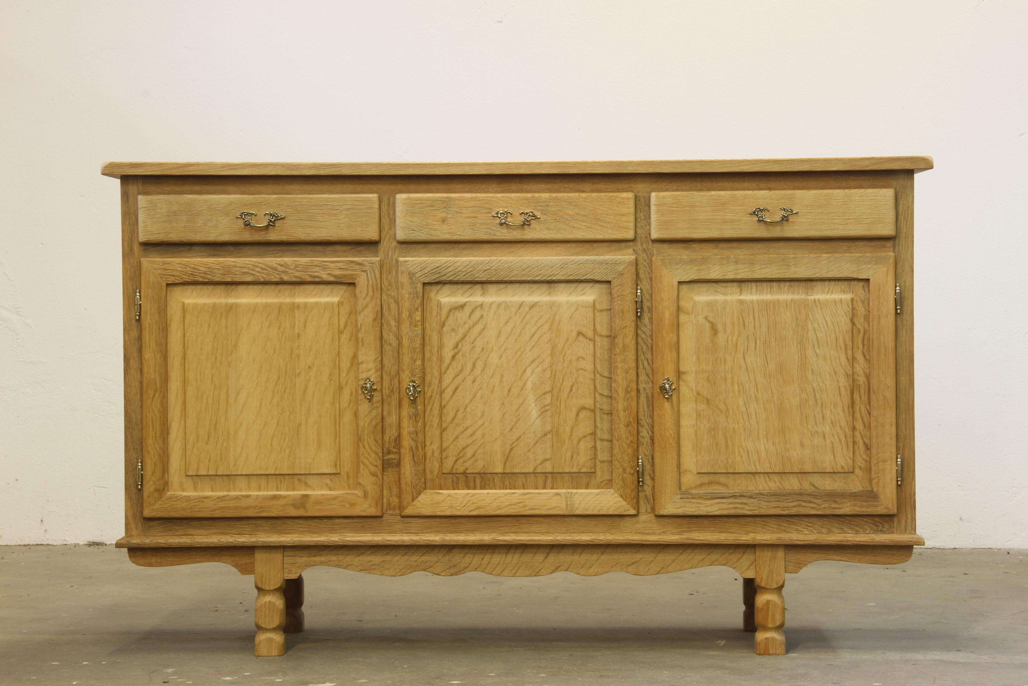 Late 20th Century Danish Oak Low Cabinet, Sideboard in the style of Henning Kjærnulf, 1970s For Sale