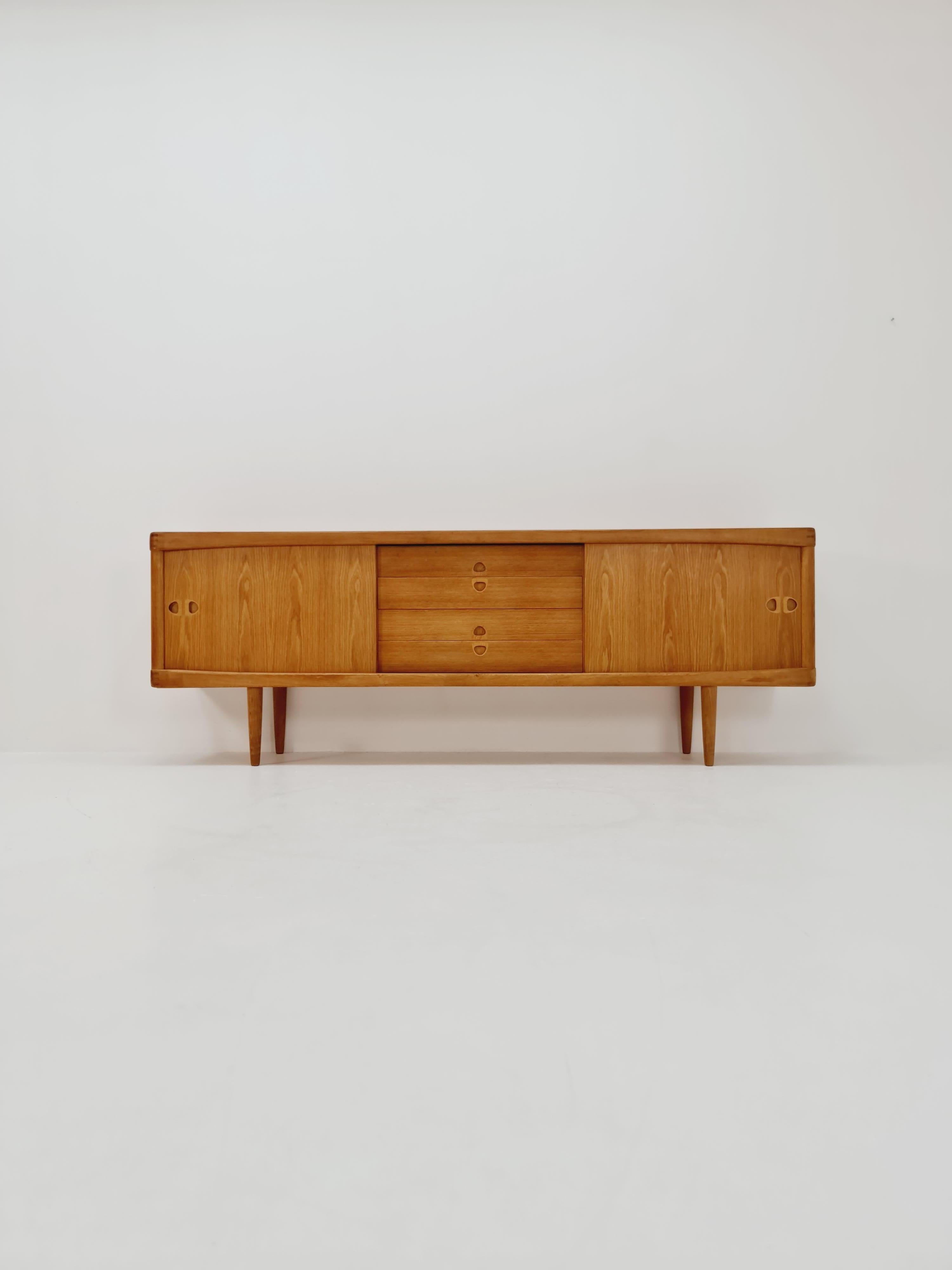 Danish Oak Sideboard by H.W Klein for Bramin, 1960s

Designer H.W Klein for Bramin
Danish Design

Dimensions: 
44 D x 224 W x 80 H cm

It is in good vintage condition, however, as with all vintage items some minor wear marks should be