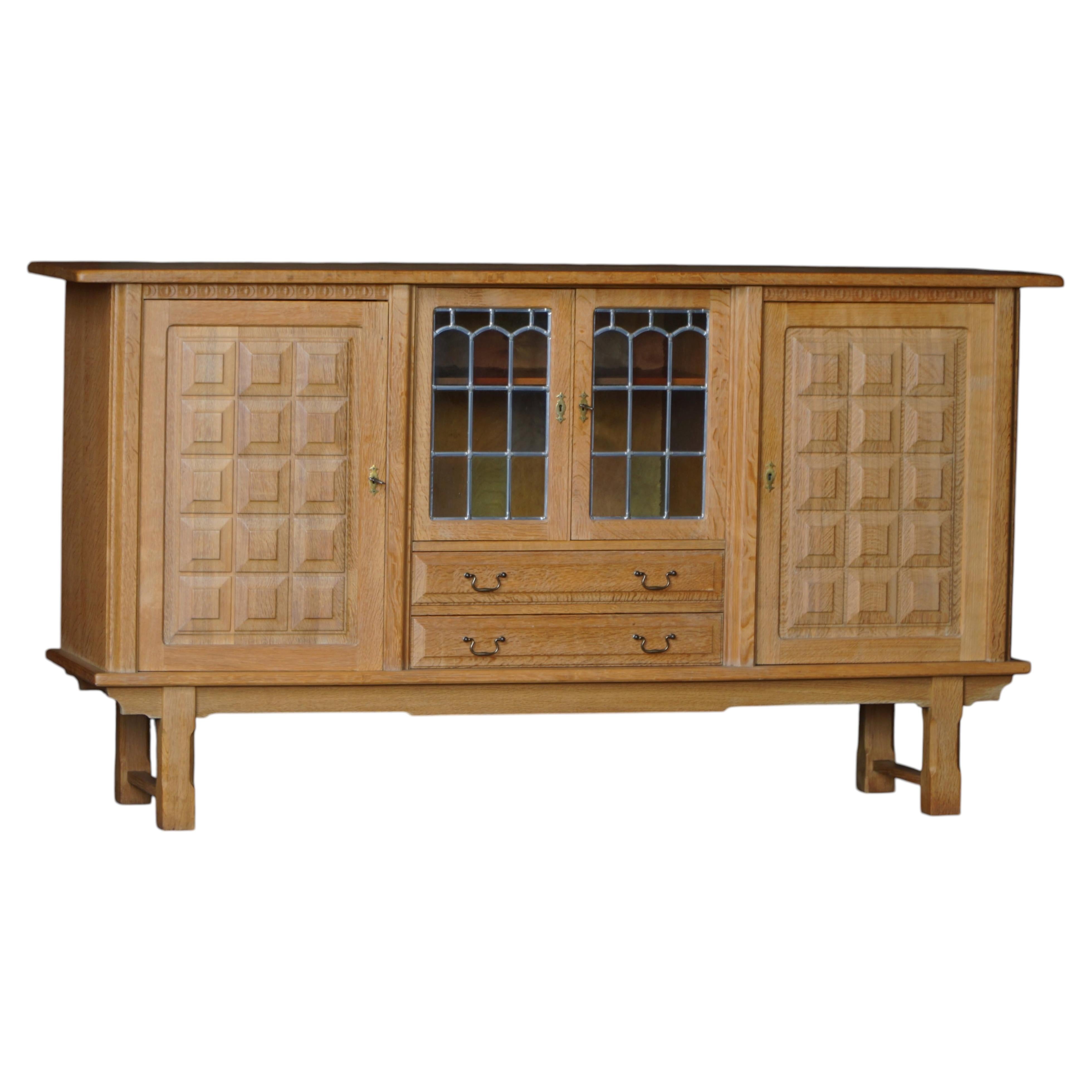 Danish Oak Sideboard with Leaded Glass Doors, Henning Kjærnulf, Denmark, 1960s