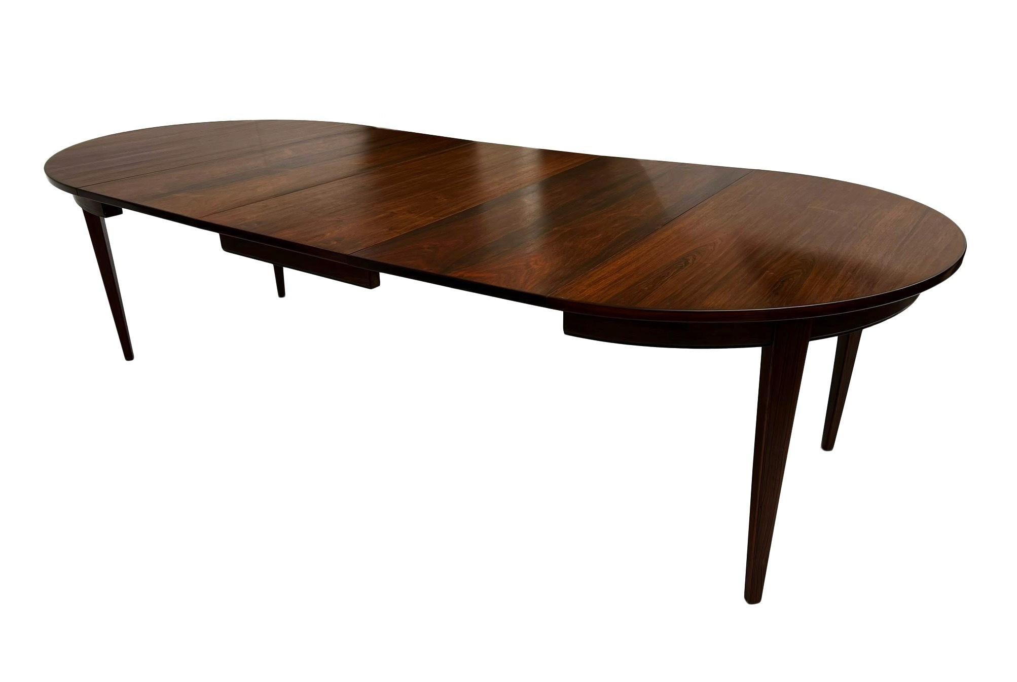 Mid-Century Modern Danish Omann Jun Model 55 Triple Extending Rosewood Dining Table