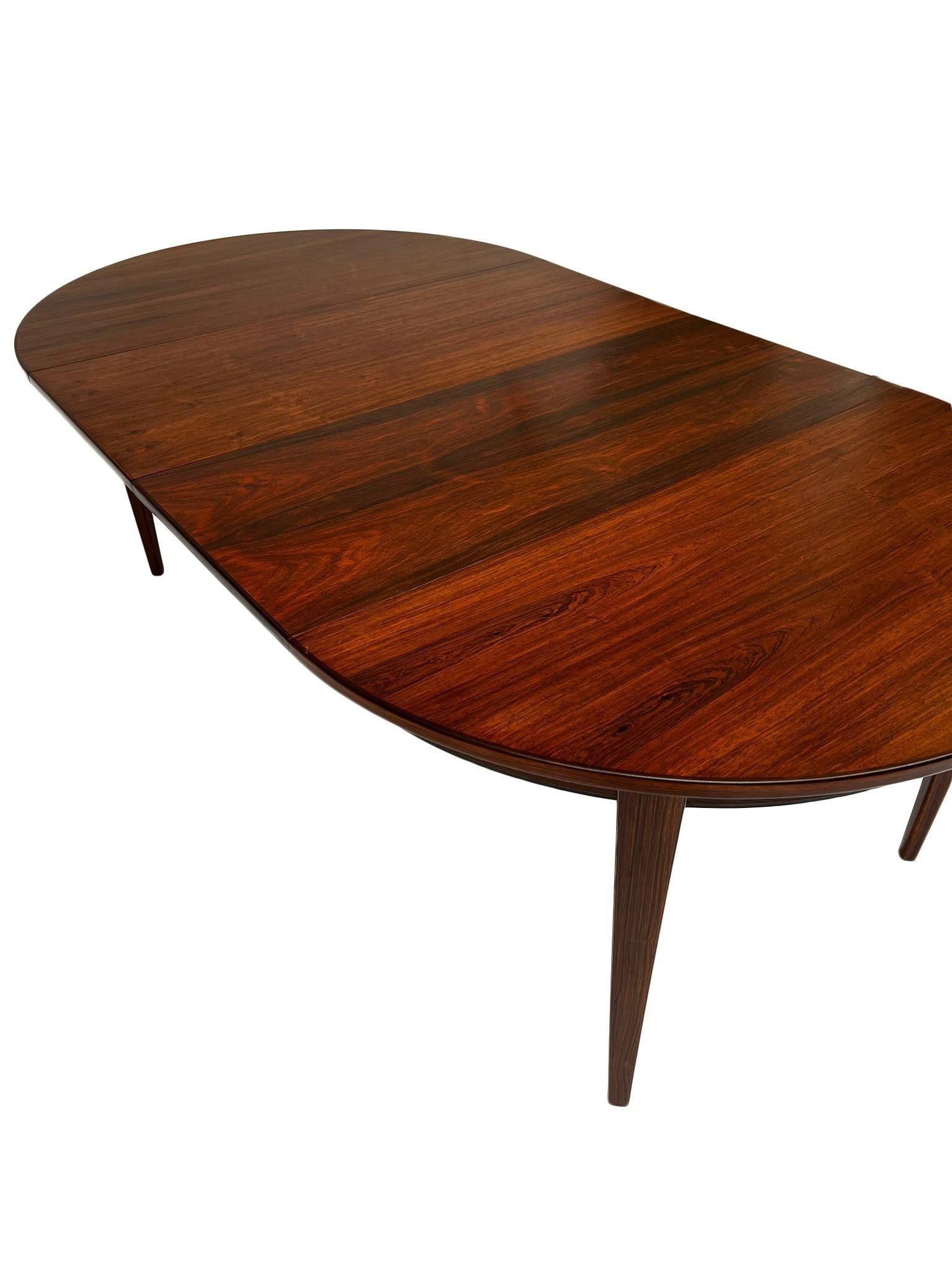 Danish Omann Jun Model 55 Triple Extending Rosewood Dining Table In Excellent Condition In London, GB