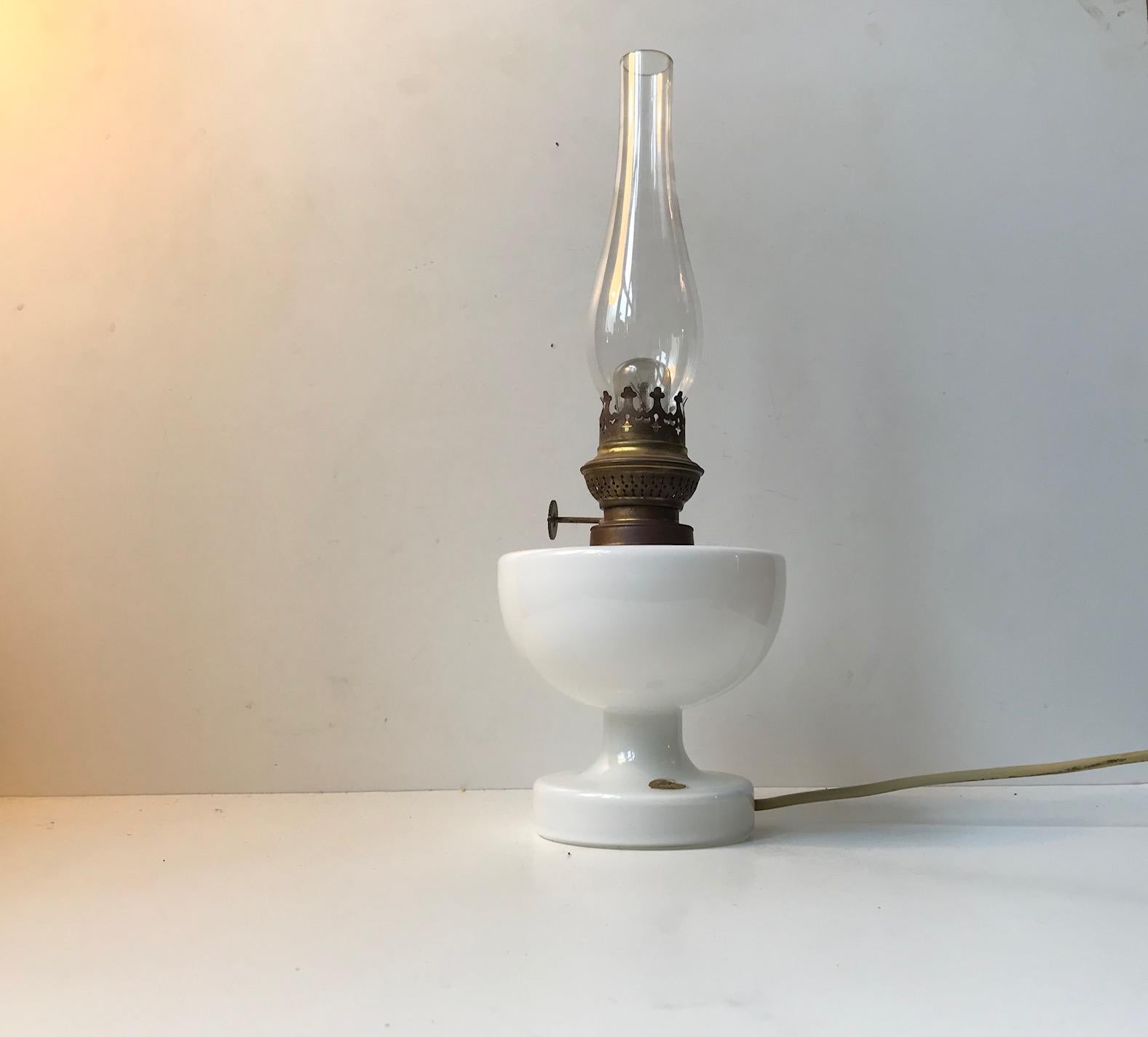- Converted oil lamp called Victoria
- Its was designed by Michael E. Bang 
- Manufactured by Holmegaard in Denmark during the 1960s
- Old paper sticker from Holmegaard-Kastrup still present.