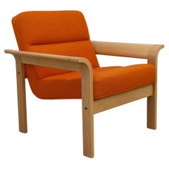 Danish Orange Oak Botium Lounge Chair by Magnus Olesen, 1970s.