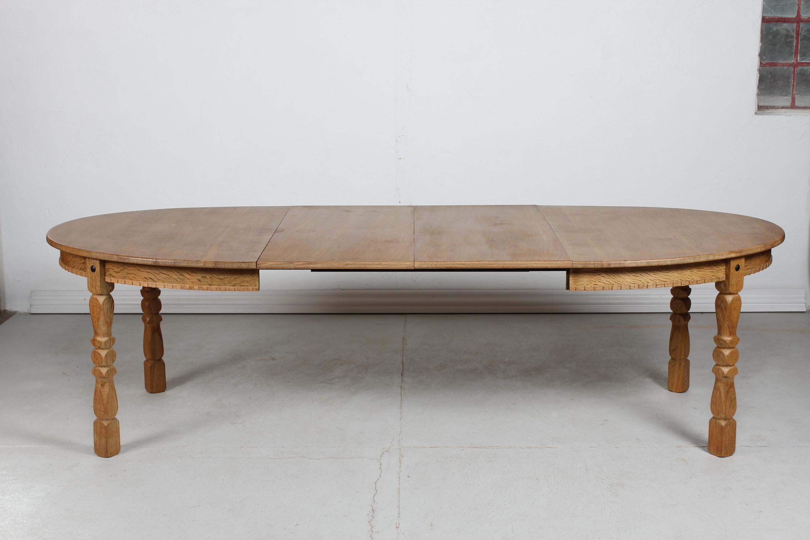 Danish Oval Extendable Dining Table of Oak in Henning  Kjærnulf Style 1970s For Sale 3