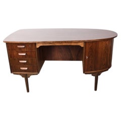 Danish oval rosewood desk by Gunni Omann 1960.