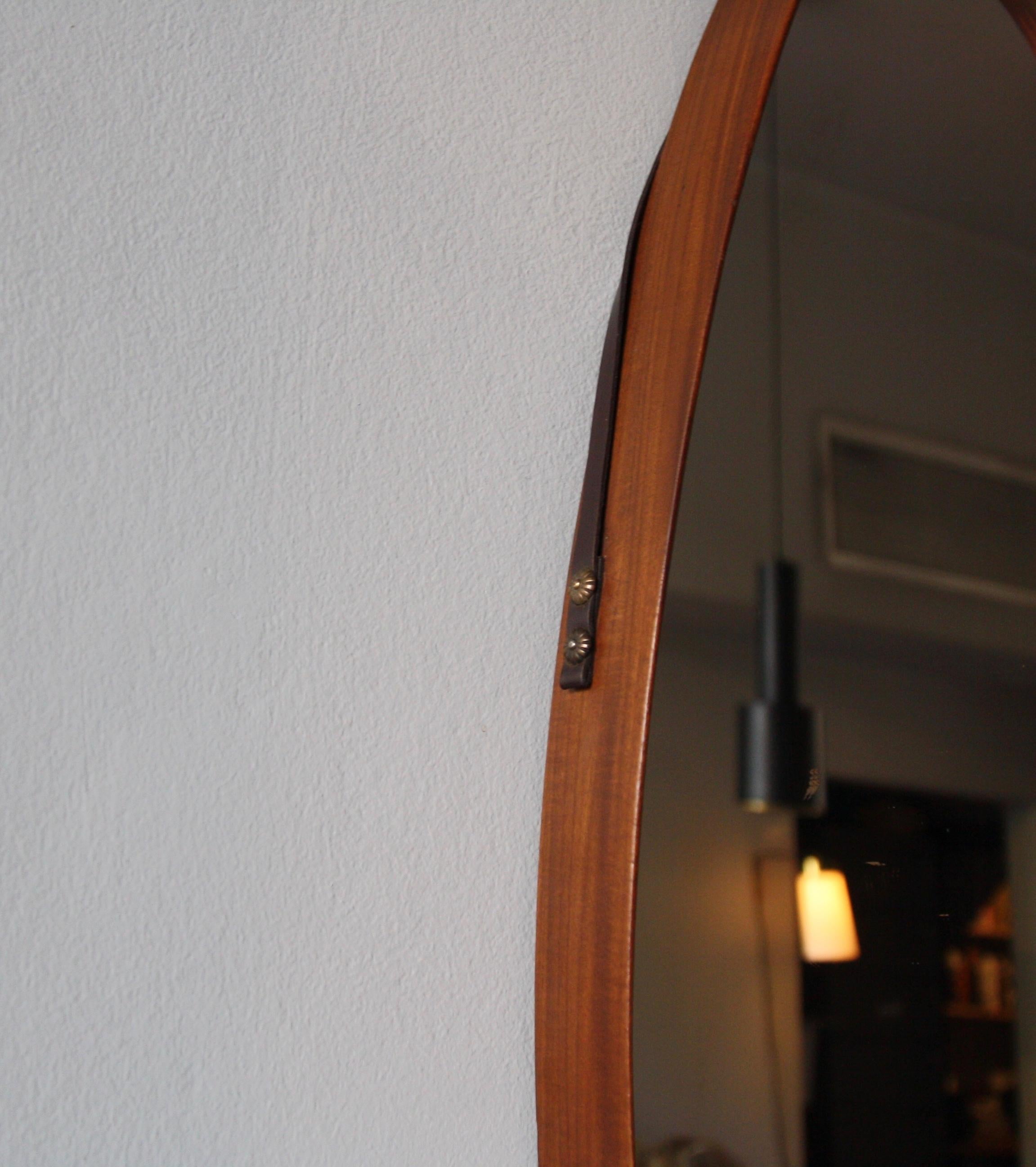 Mid-Century Modern Danish Oval Shaped Vintage Wall Mirror with Leather Hanging Strap, circa 1950