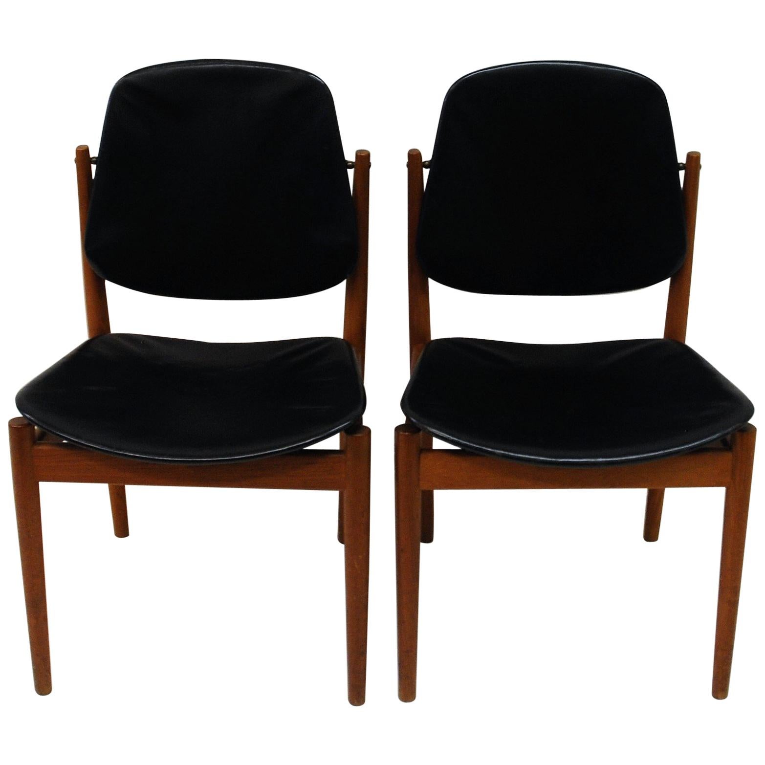 Danish pair of  Diningchairs by Arne Vodder in teak and black leather, 1950s