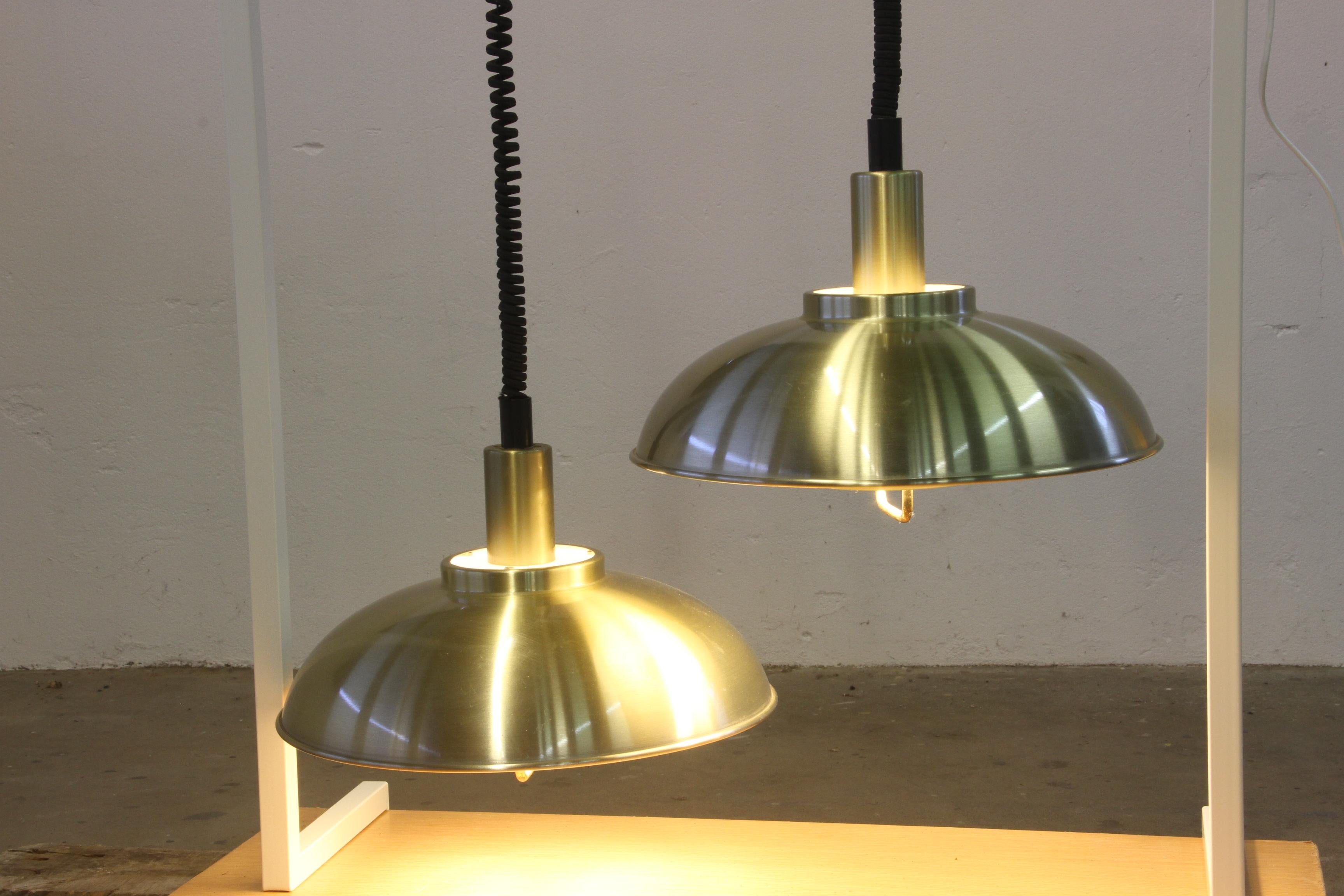 Danese Coppia danese di lampade a sospensione/soffitto in ottone attribuite alla ditta Frandsen 1 in vendita