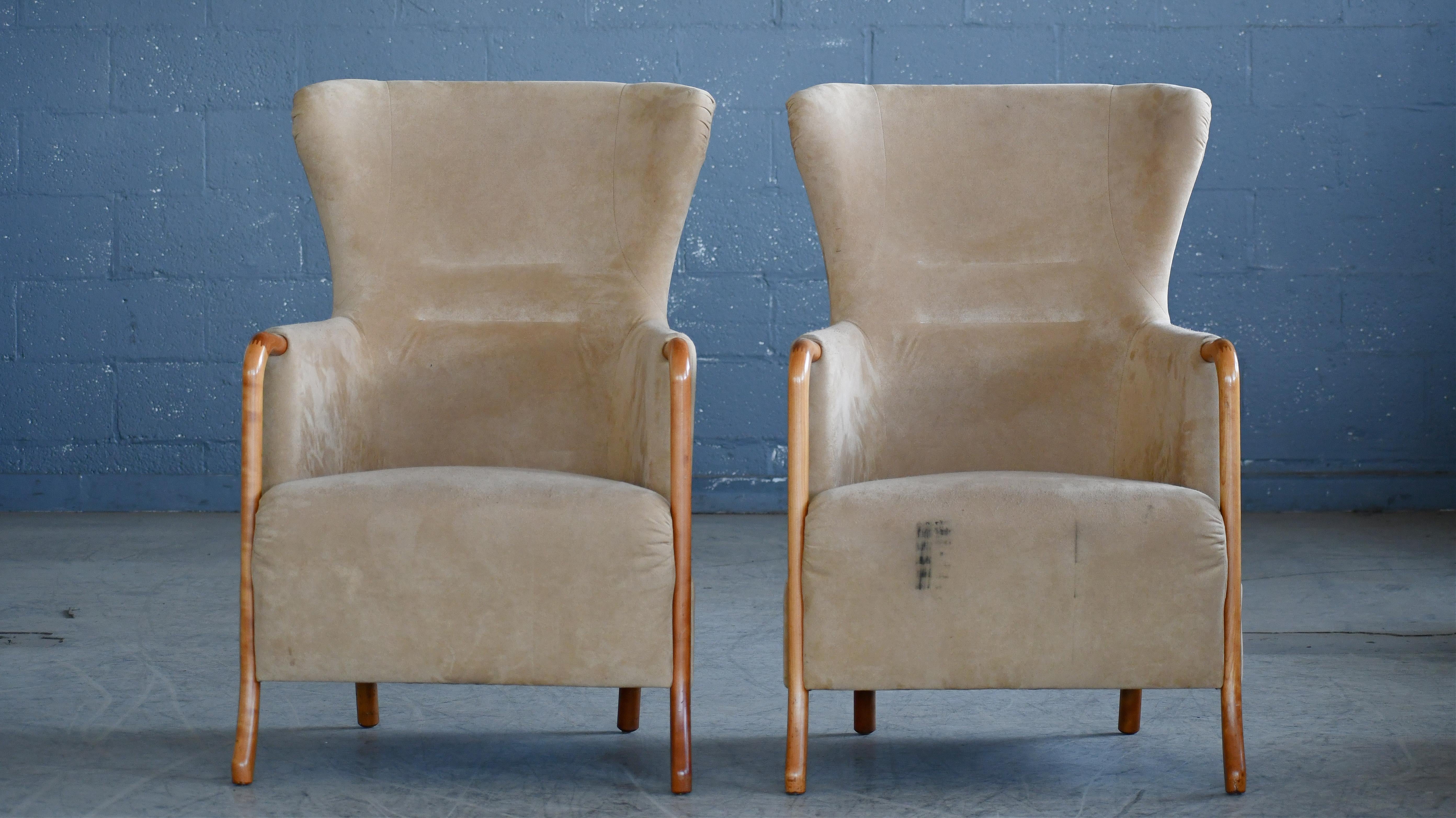 Scandinavian Modern Danish Pair of Wingchairs w/ Ottoman Model Claudia in Suede and Oak by Stouby