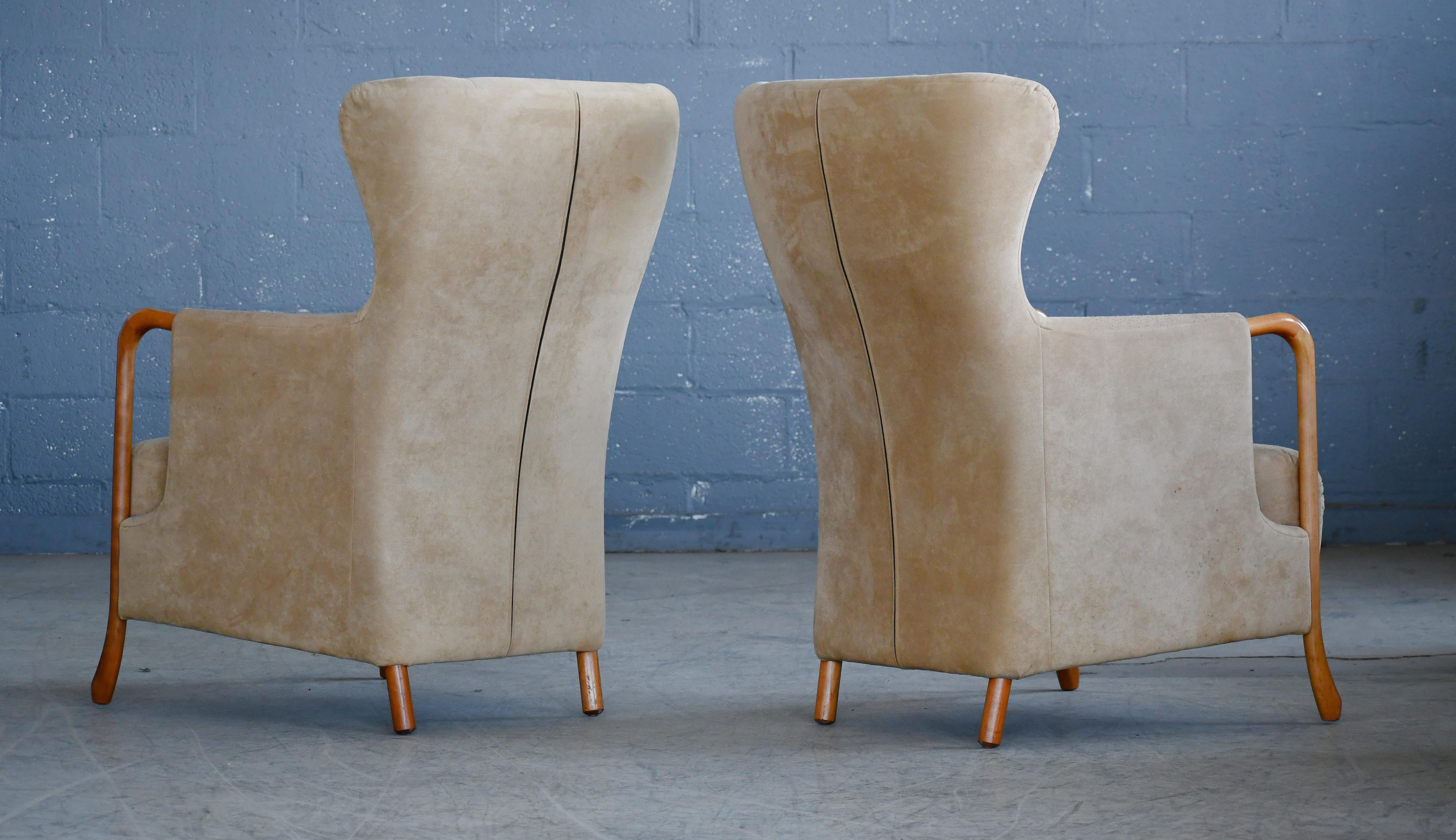 Contemporary Danish Pair of Wingchairs w/ Ottoman Model Claudia in Suede and Oak by Stouby