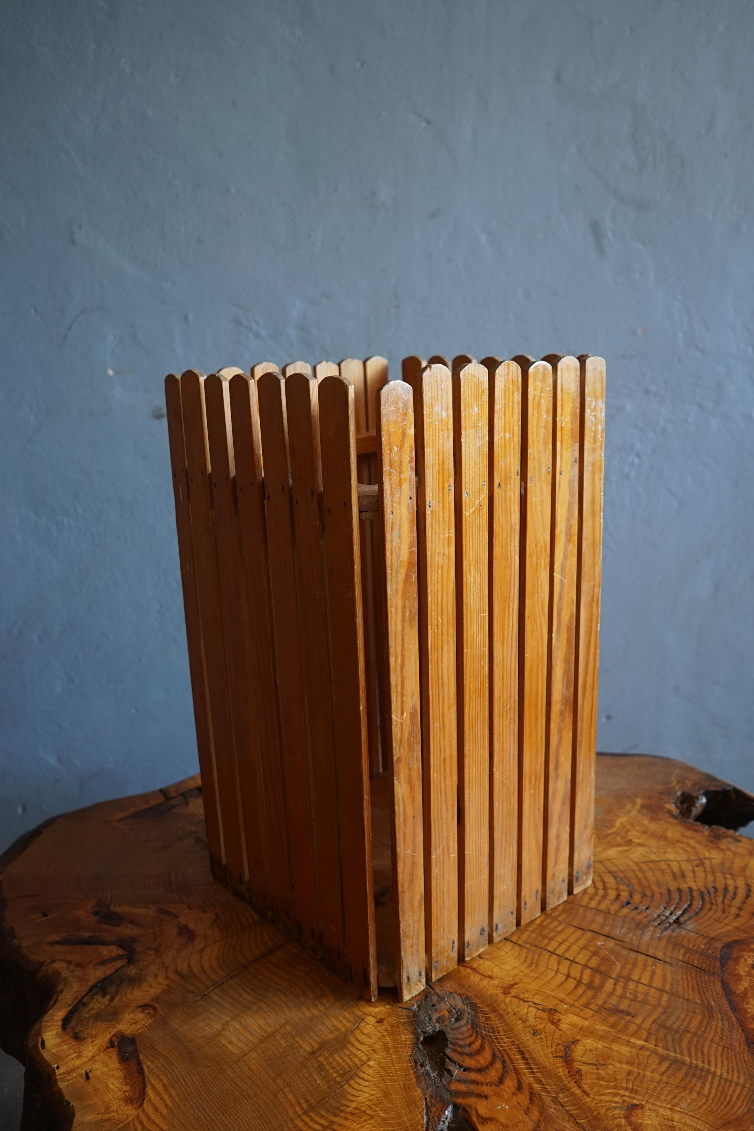 Rare hand build waste paper basket made a talented Danish craftsman in beautiful solid strips of patinaed pine in Denmark in the 1960's.

This waste paper basket is the perfect piece for any style of interior from the traditional Scandinavian style