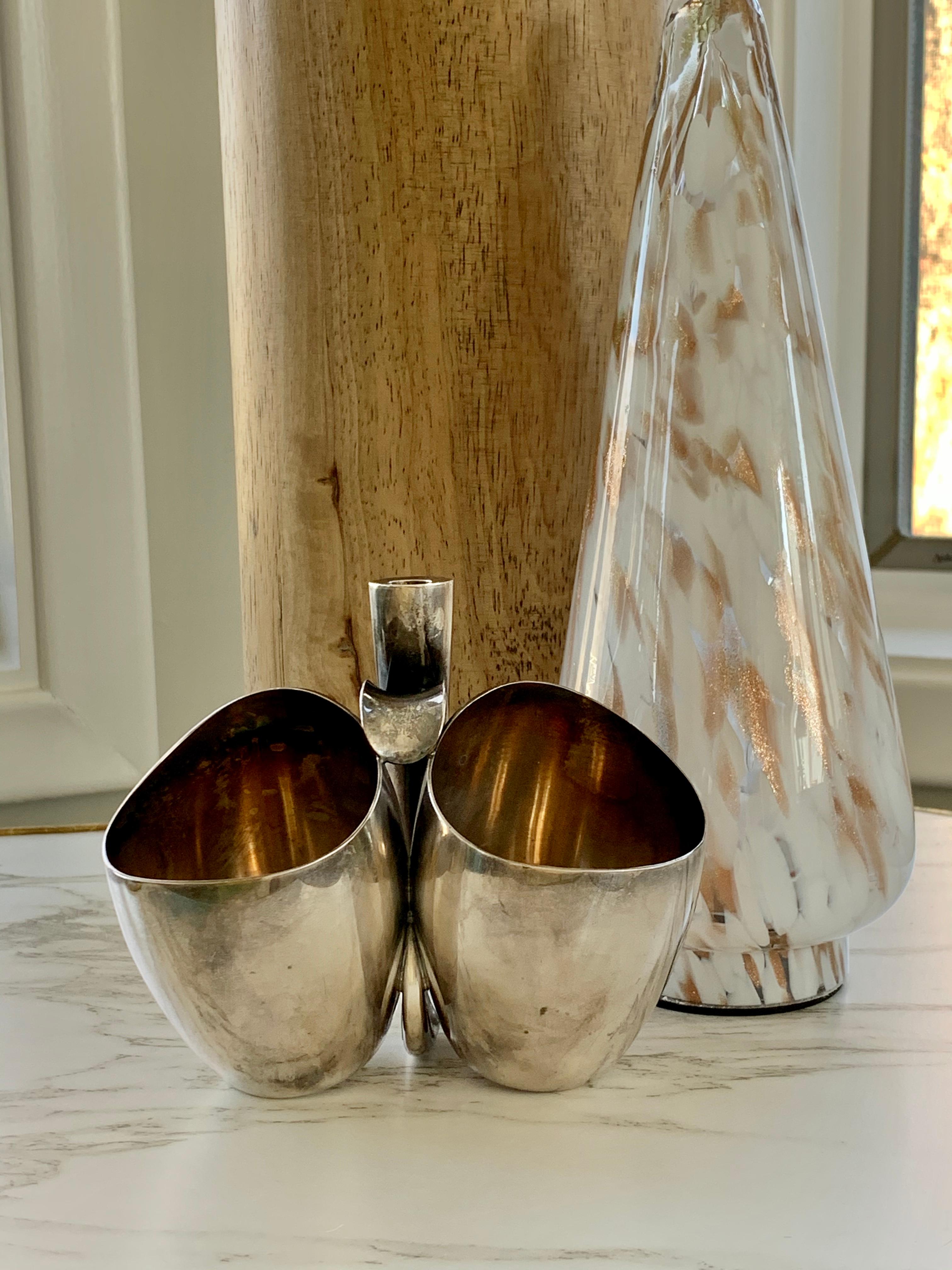 This beautiful Modernist piece is consistent with the Paul Bang Modernist design,

Measurements: 4” tall at the highest point and 5” wide at the widest point

Very good condition - slightly tarnished but with no obvious marks or scratches

These