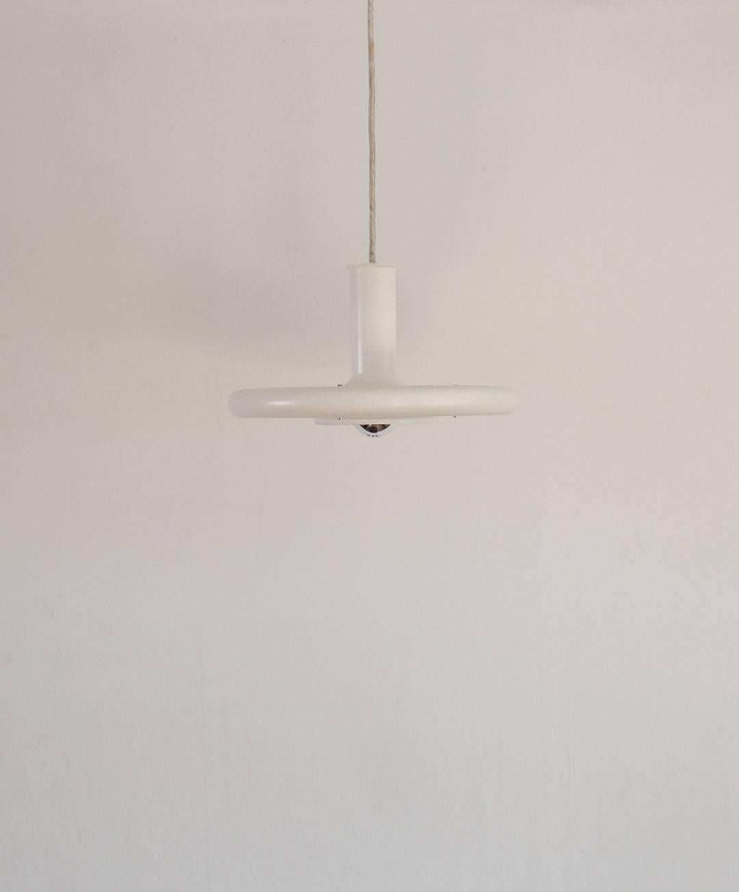 Danish pendant by Fog & Mørup (Lyskær), model 'Optima'. Design Hans Due. 
Pendant in white metal, white and red inner shade. Optima is specially designed for silver bulbs, thus obtaining the flattest possible fitting, where the shade covers only a
