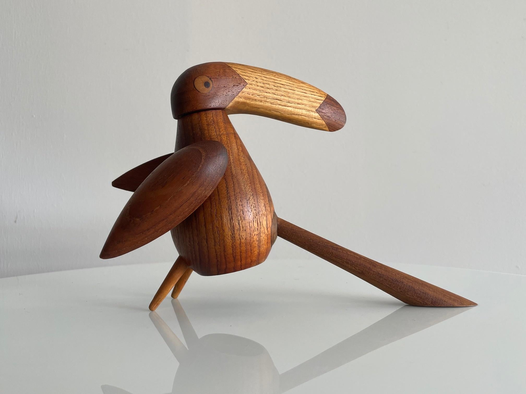 An unusual Danish teak peppermill shaped like a penguin. Movement by Peugeot Freres, France.