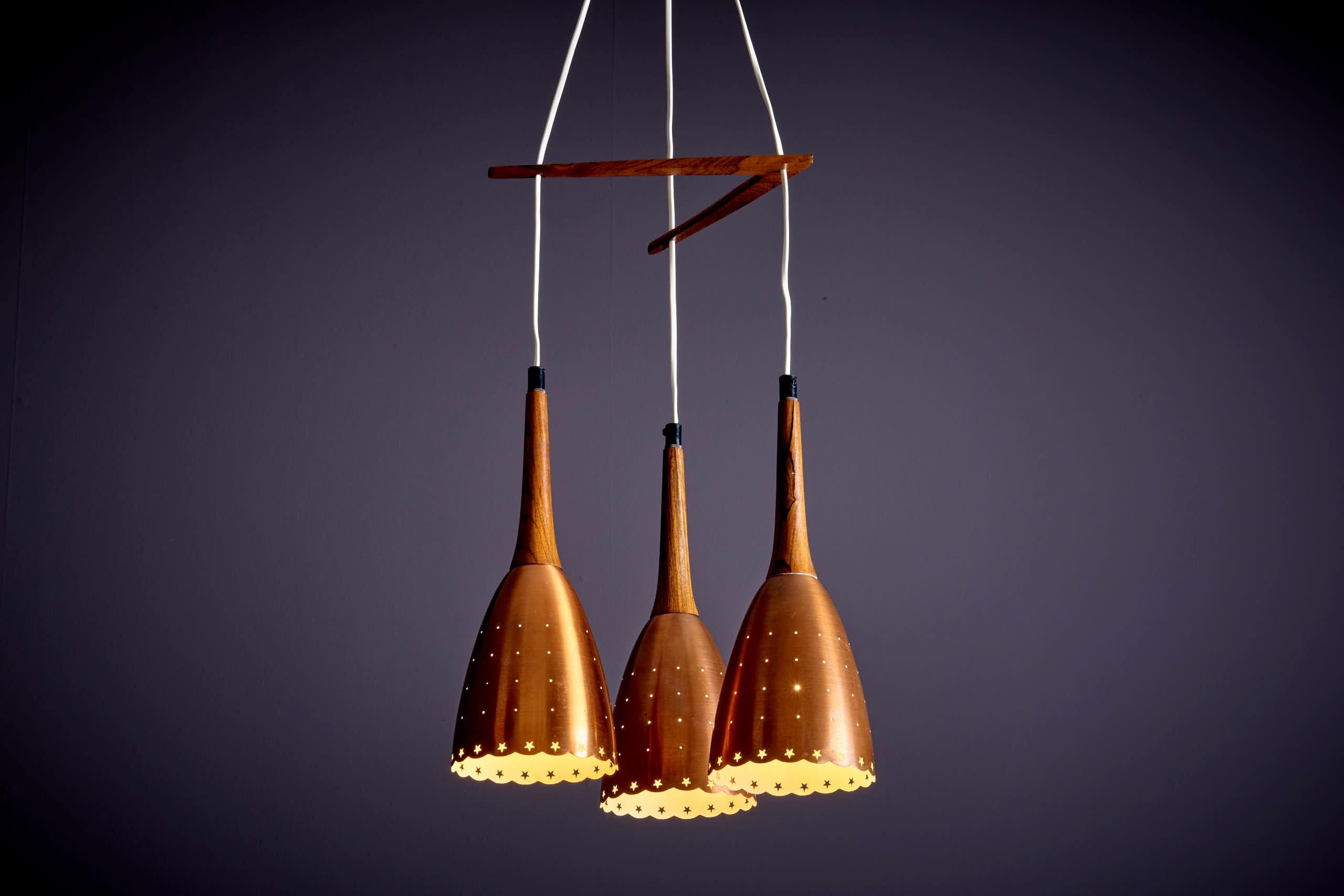 Very nice rosewood and copper cascade pendant lamp in very good condition.