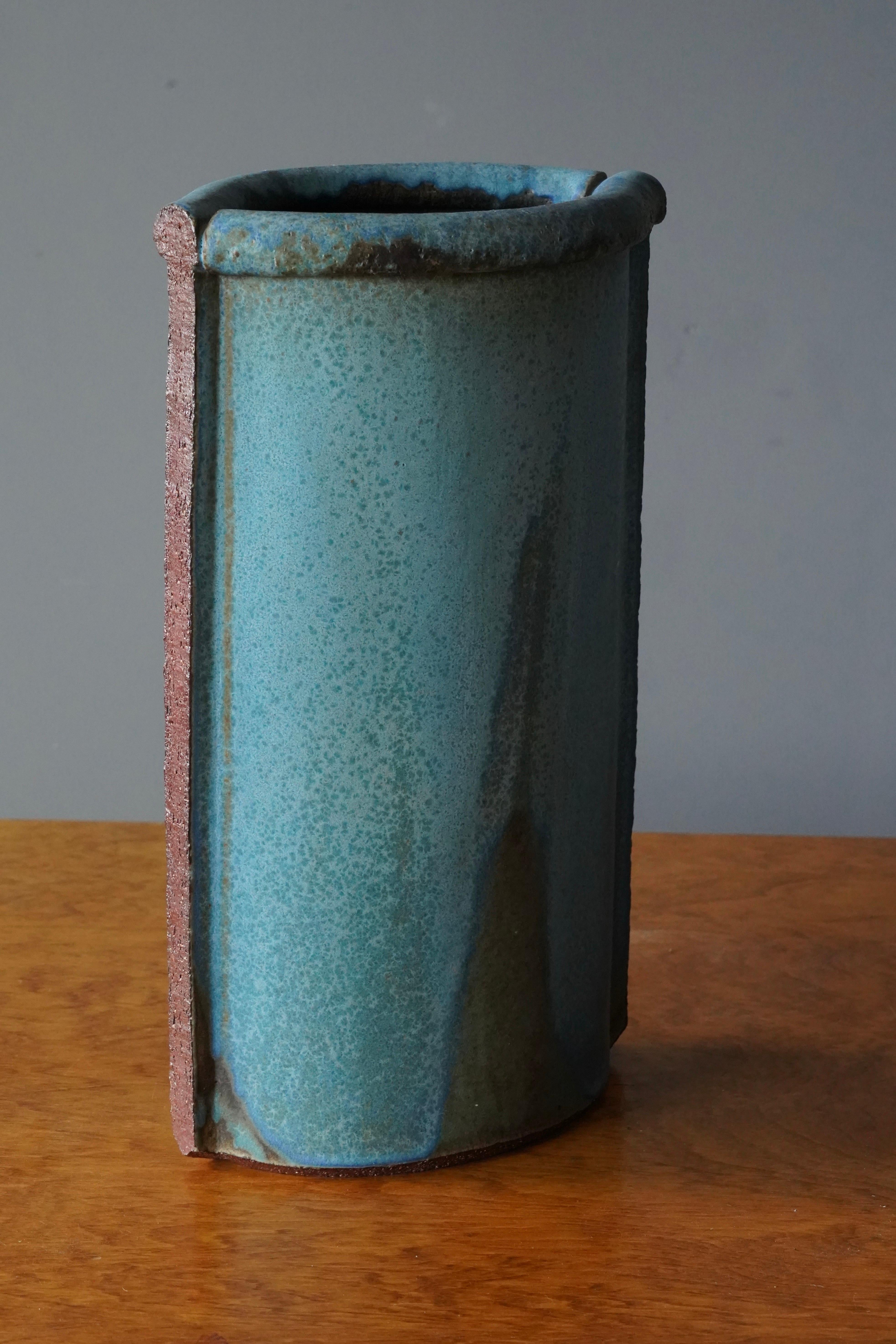 A large vases. In blue-glazed ceramic. Unsigned. Produced in Denmark, c. 1960s.