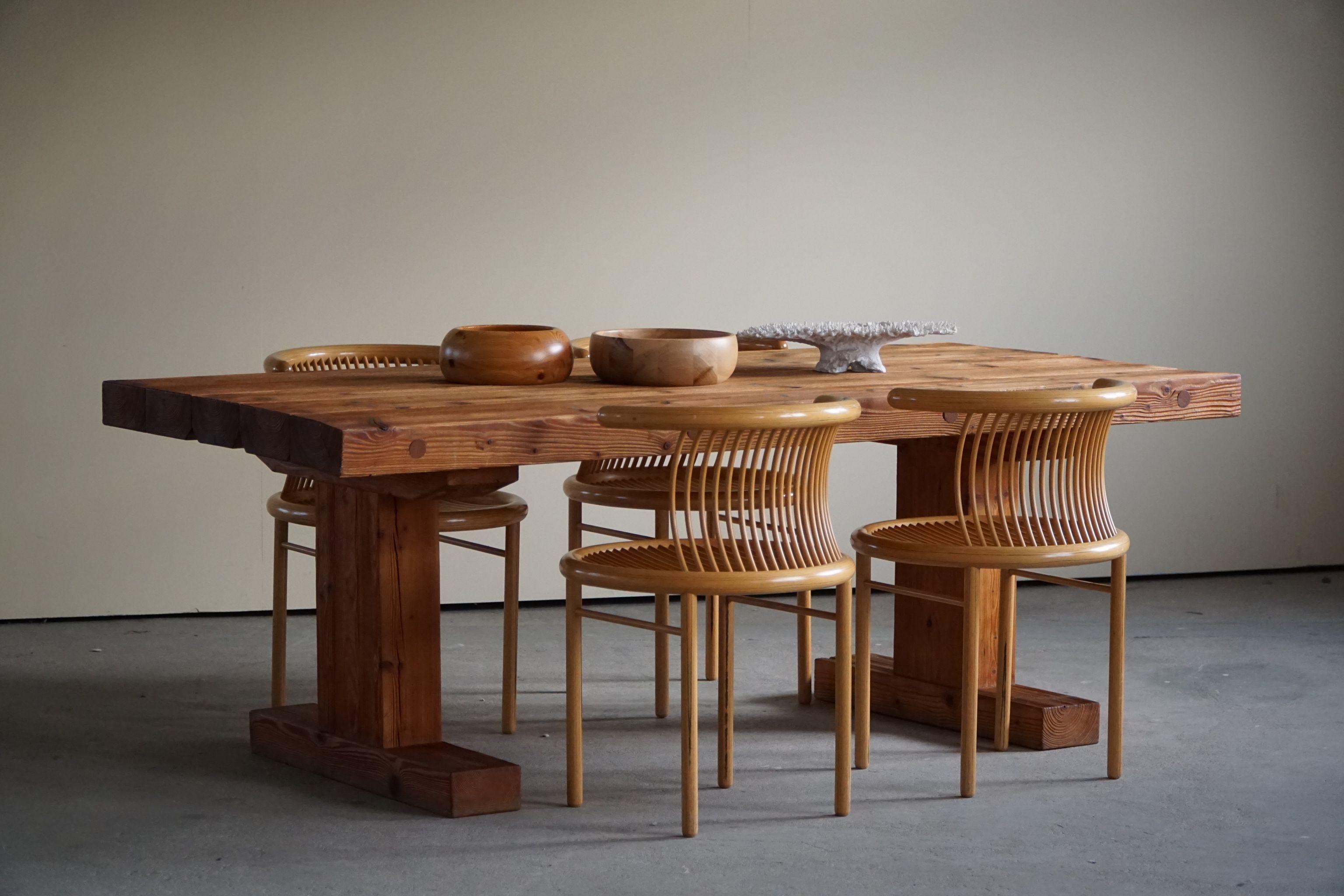 This Danish modernist/Brutalist dining table was designed and made by Jens Lyngsøe, in 1980s. The rare dining table is made of solid pine from old demolished warehouses in Copenhagen dated back to 1800s.