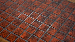 Danish red ceramic and teak coffee table