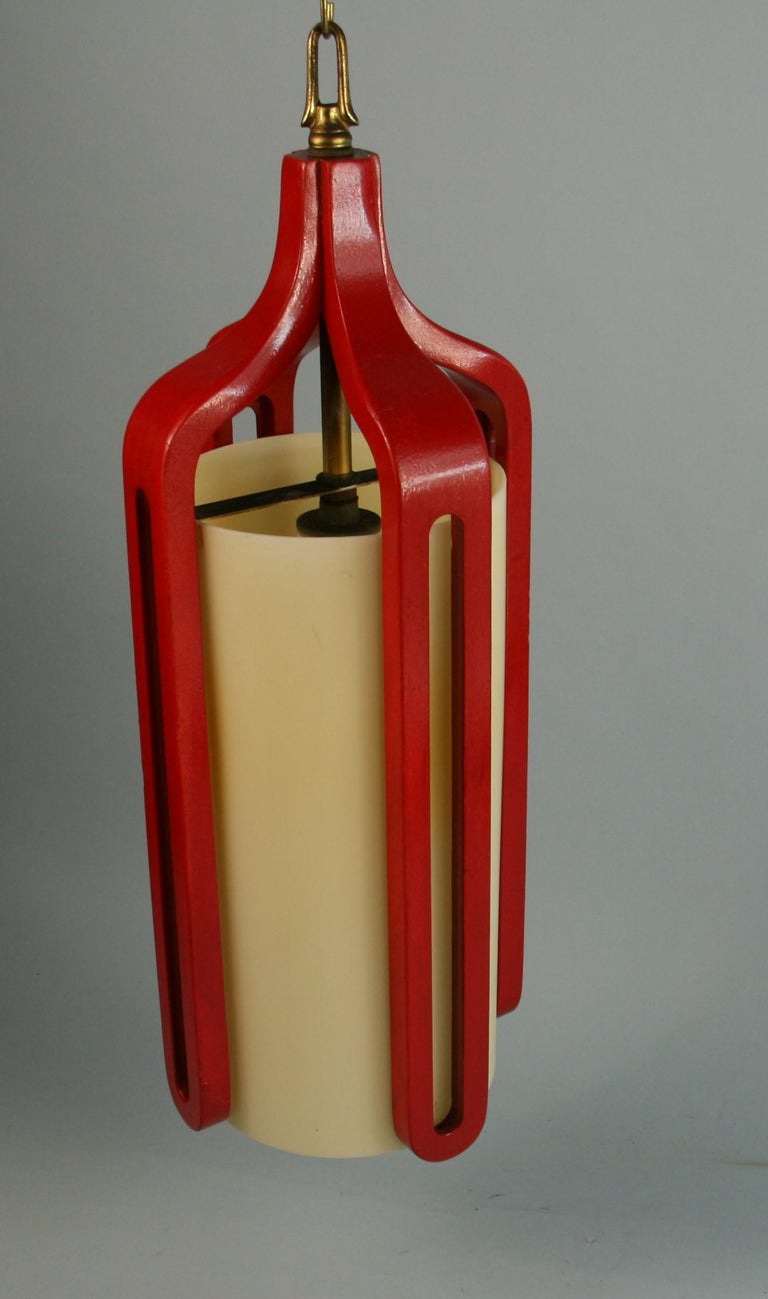 3-596 Danish wood pendant painted red with fiberglass diffuser 
Takes one 60 watt edison based bulb
Rewired.
 