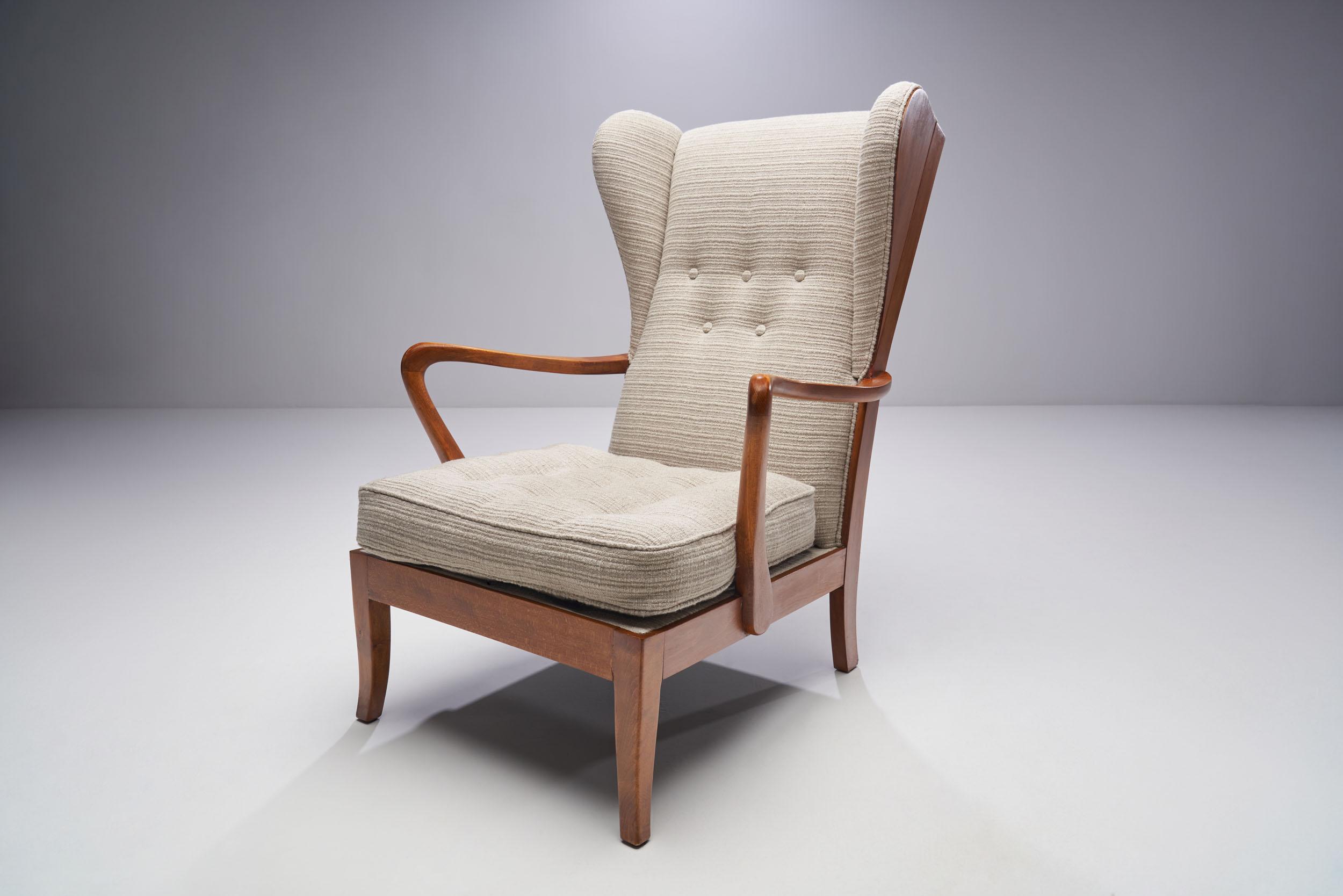 This Danish cabinetmaker chair often referred to as “Øreklapstolen” or “ear flap chair” is a great example of the Danish Mid-Century Modern aesthetic.

Danish design is torn between epochs; it is a term that accommodates both the functional