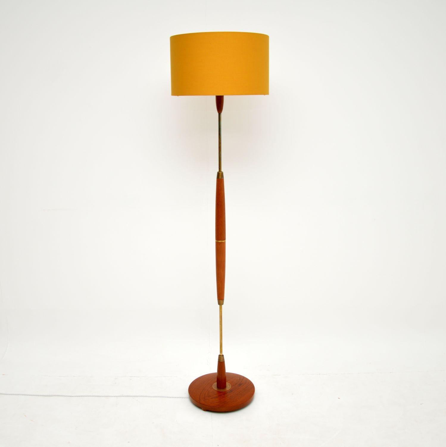 A stunning vintage lamp in solid teak and brass. This was most likely made in Denmark, it dates from the 1960’s.

We have had the wood stripped and re-polished to a very high standard, it is in superb condition for its age.

We have had this
