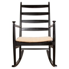 Danish Rocking Chair, in lacquered teak and fabric model 218, Thomas Harlev 1960