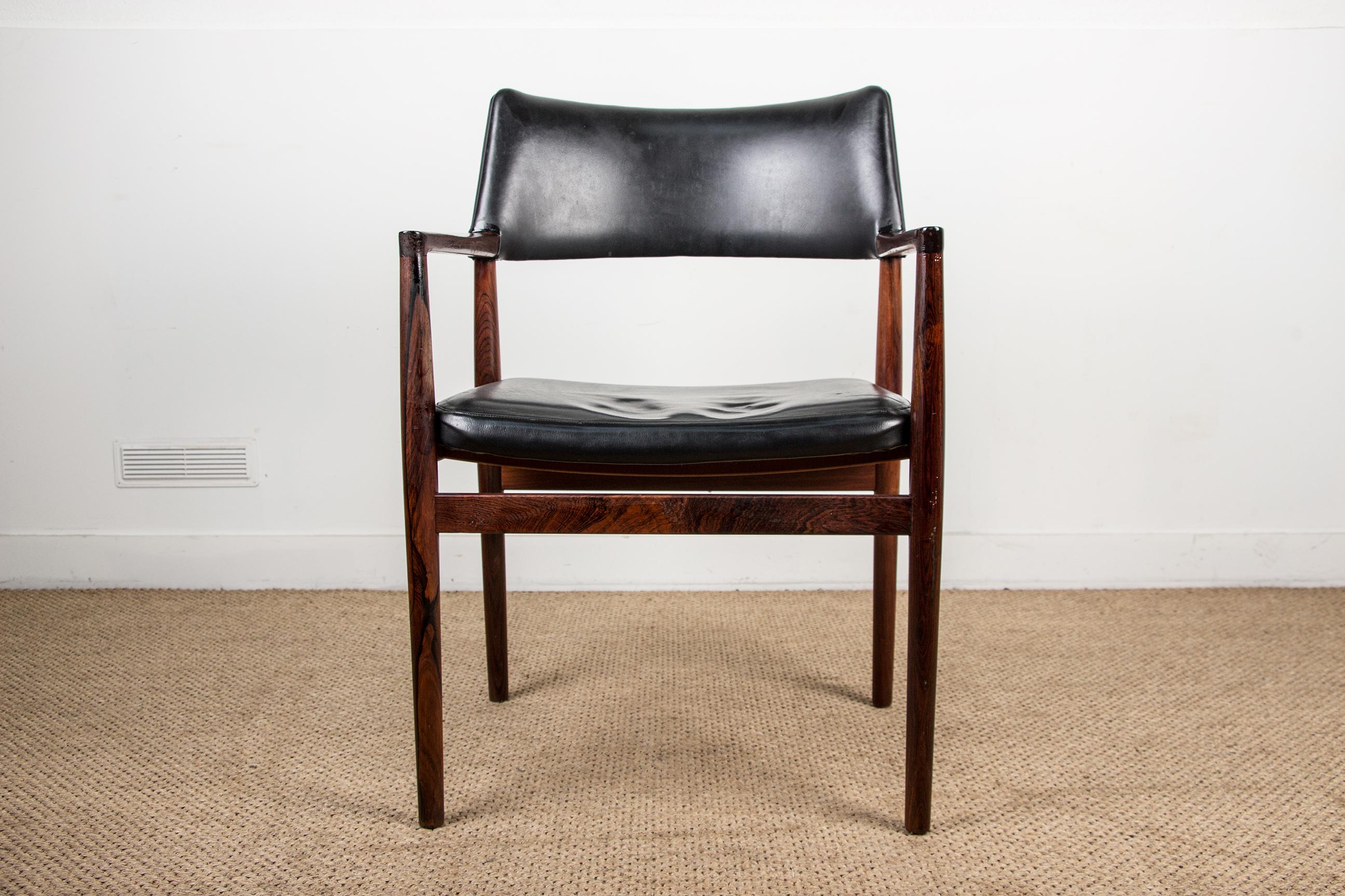 Superb Scandinavian armchair. Structure in solid Rio rosewood, seat and back in original leather. Very elegant piece of furniture listed by the Design Museum Denmark under the number RP03700.