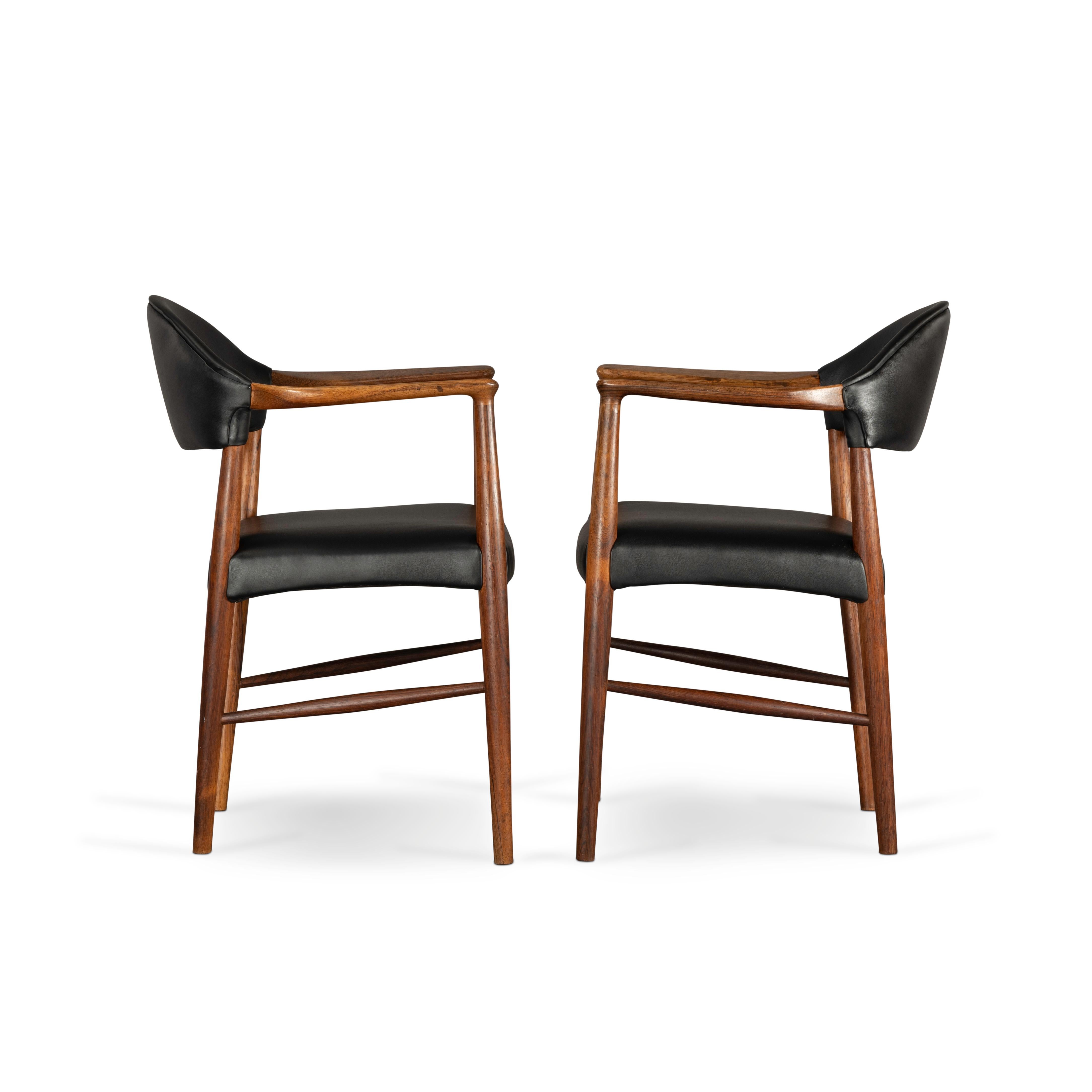Kurt Olsen designed a heavy palisander/rosewood frame for this particular chair. It just builds character for the chair. On this example the use wear and polish of the arm rests give it a 'used for centuries' type of look. We renewed the leather on