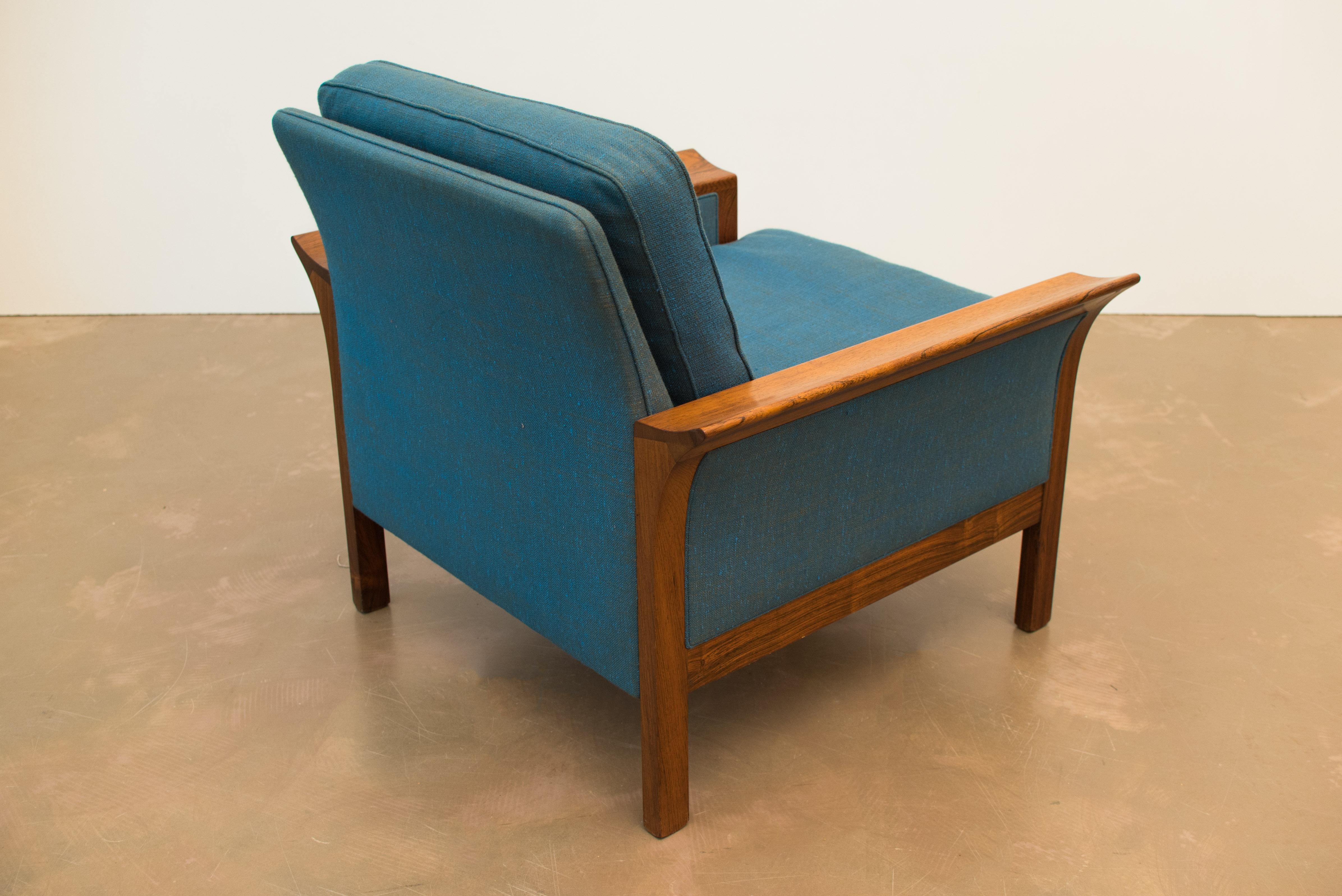 Mid-Century Danish rosewood armchair featuring the original upholstery.
 