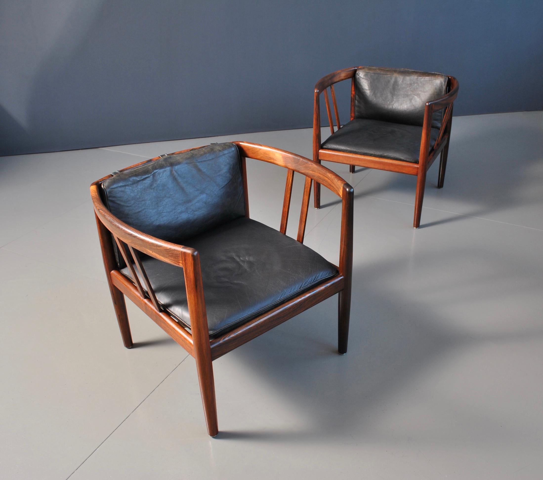 A pair of extremely rare Danish lounge chairs designed by Illum Wikkelsø for Holger Christiansen, Denmark circa 1960. These superb low profile armchairs are wonderful examples of Wikkelsø’s design genius. Fantastic craftsmanship from Holger