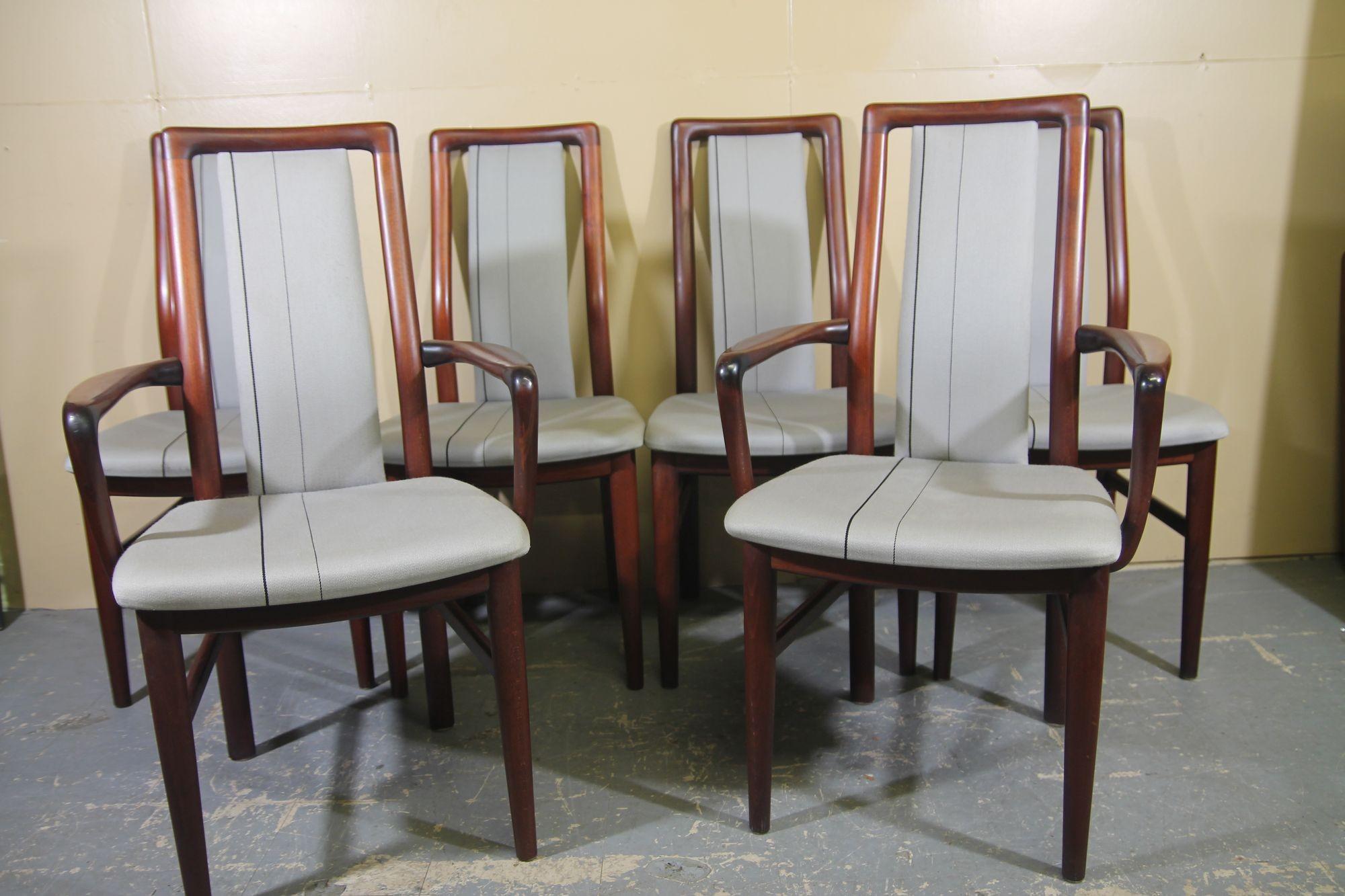 Pleased to offer this great set of 6 rosewood dining chairs by SVA Mobler. This set consist of 2 arm chairs and 4 armless chairs. Arm chairs are 22 x 18 x 37.5, side chairs are 18.5 x 18 x 37.5. This set is in great vintage shape. The fabric is in