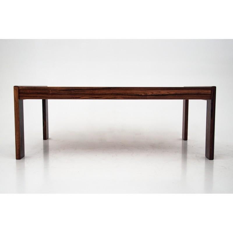 An elegant, rosewood coffee table from Denmark, from circa 1960s.
Minimal and simple form. 
Beautiful rosewood condition.
  