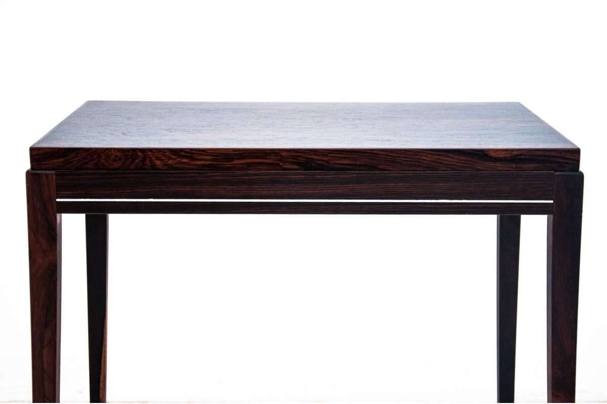 Coffee table made in Denmark in the 1960s. Furniture was made of rosewood. The table is after renovation, matte.

Dimensions:

Width 56, height 52 cm, depth 36 cm.