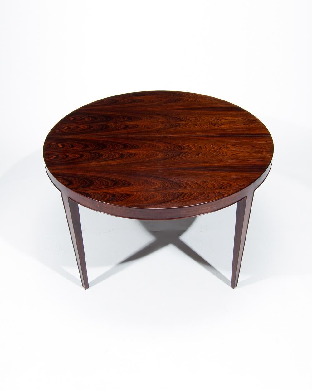 A Danish rosewood dining table with 2 additional extension leaves designed by Severin Hansen for Haslev Møbelfabrik in the 1960’s. A lovely deep rich colour and patina to the rosewood which is shown to amazing effect on this dining table. Beautiful