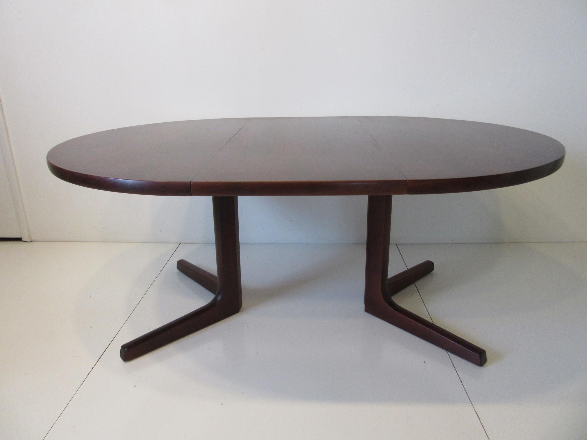 20th Century Danish Rosewood Extendable Dining Table by A & M in the Style of Erik Buch