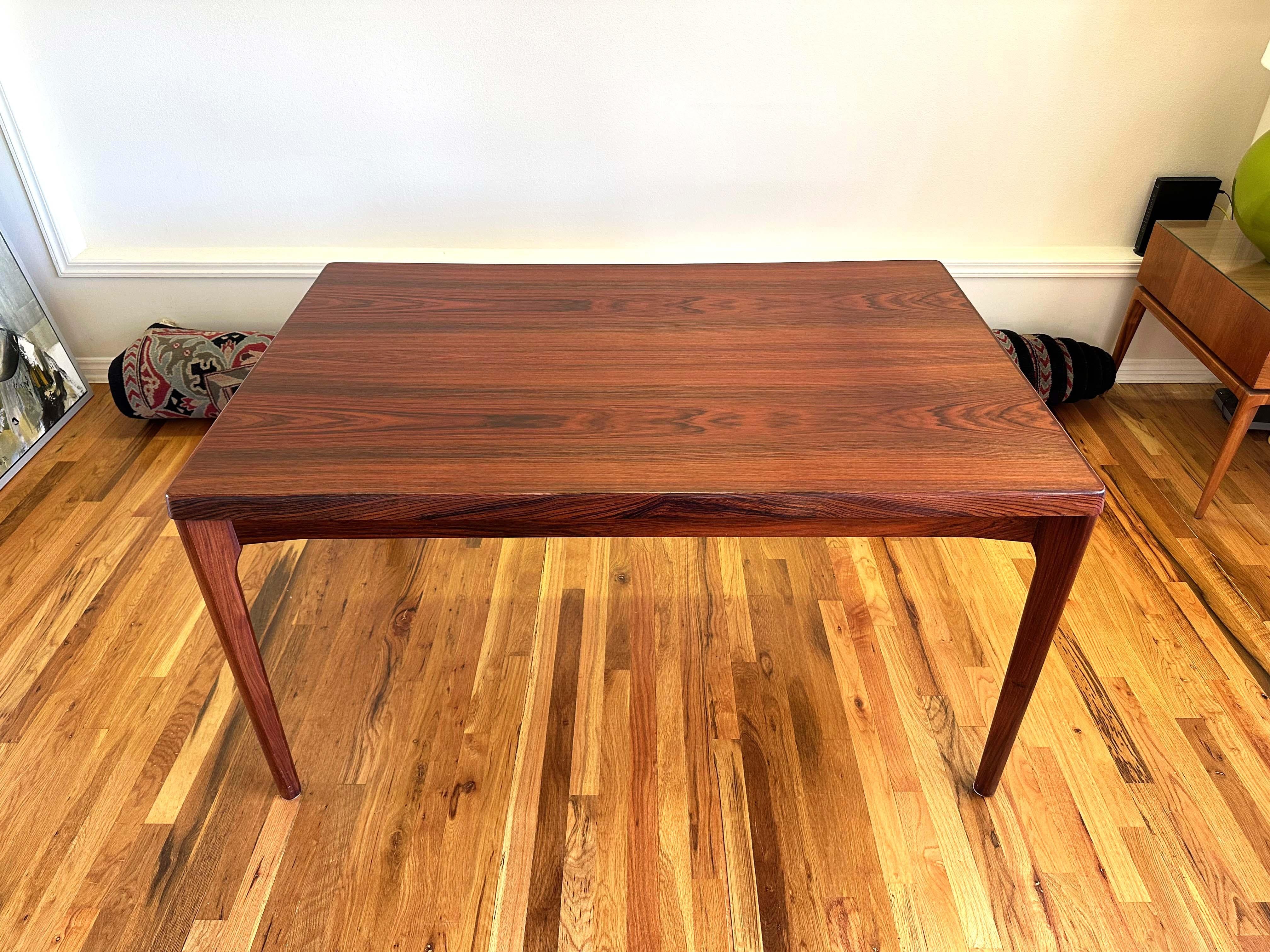 Mid-Century Modern Danish Rosewood Extendable Dining Table by Henning Kjærnulf 