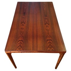 Danish Rosewood Extendable Dining Table by Henning Kjærnulf 