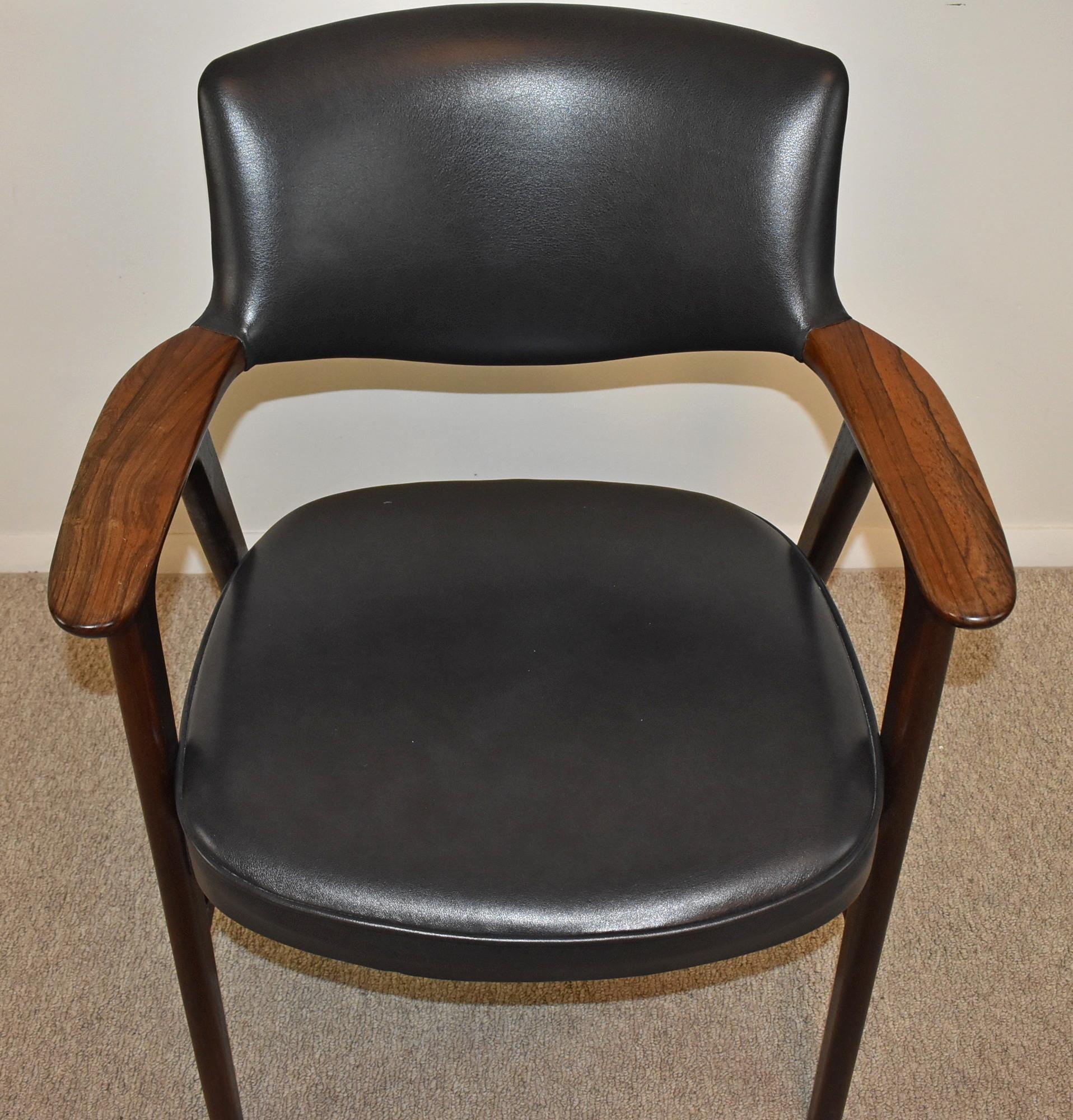 Danish rosewood leather chair by Erik Kirkegaard. circa 20th century. Model 43 black leather armchair with rosewood frame designed by Erik Kirkegaard. Great condition wear consistent with age and usage. Dimensions: 24.5