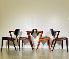 Danish Rosewood MCM dining chairs by Kai Kristiansen