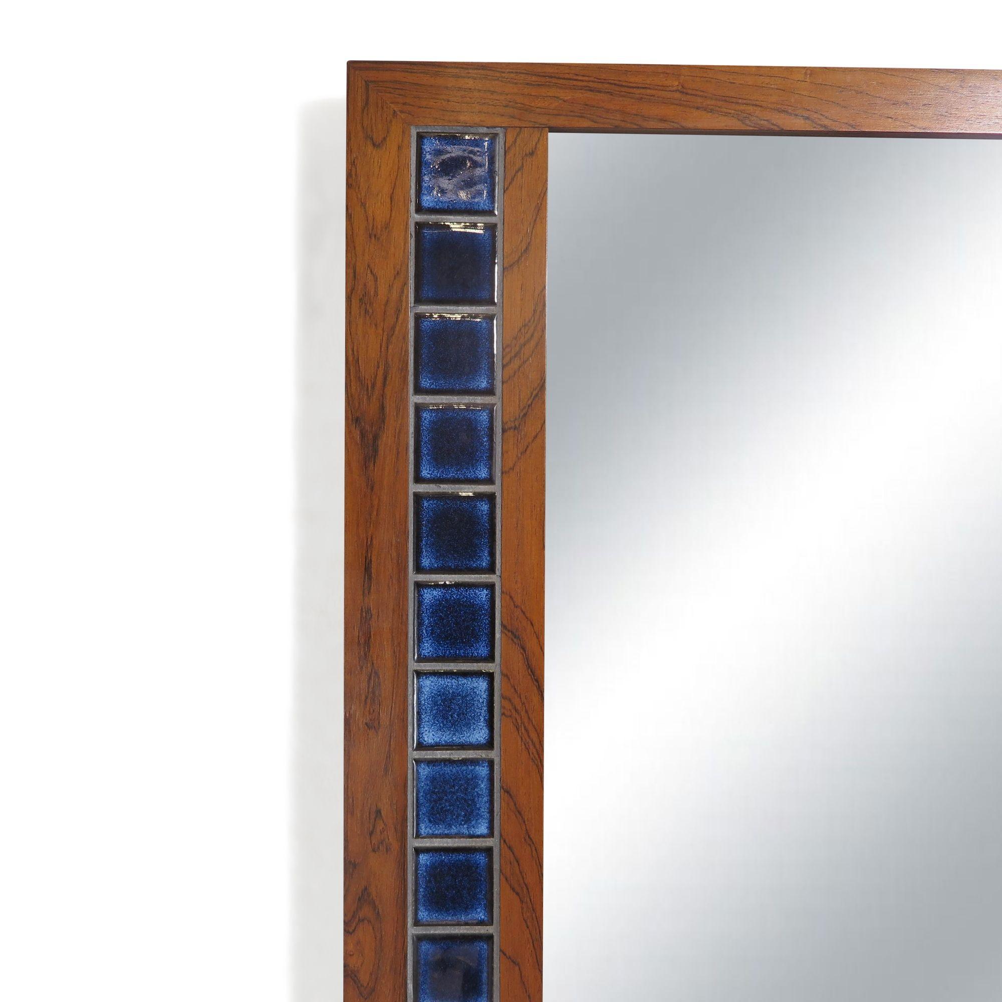 Mid-century Danish rectangular mirror with blue ceramic tiles.
Measurements
W 23'' x D 0,75'' x H 45,25''