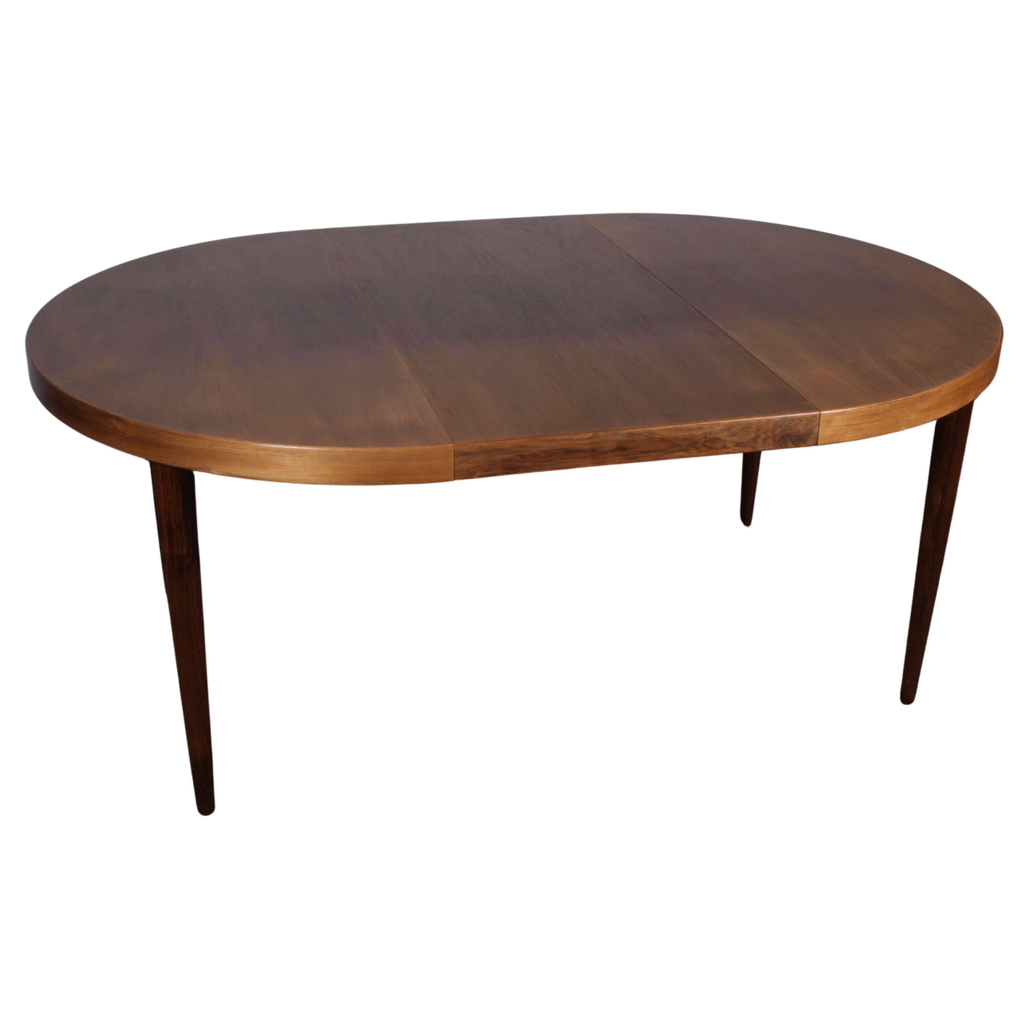 Danish Rosewood Round Extension Table in the style Kai Kristiansen, 1960s