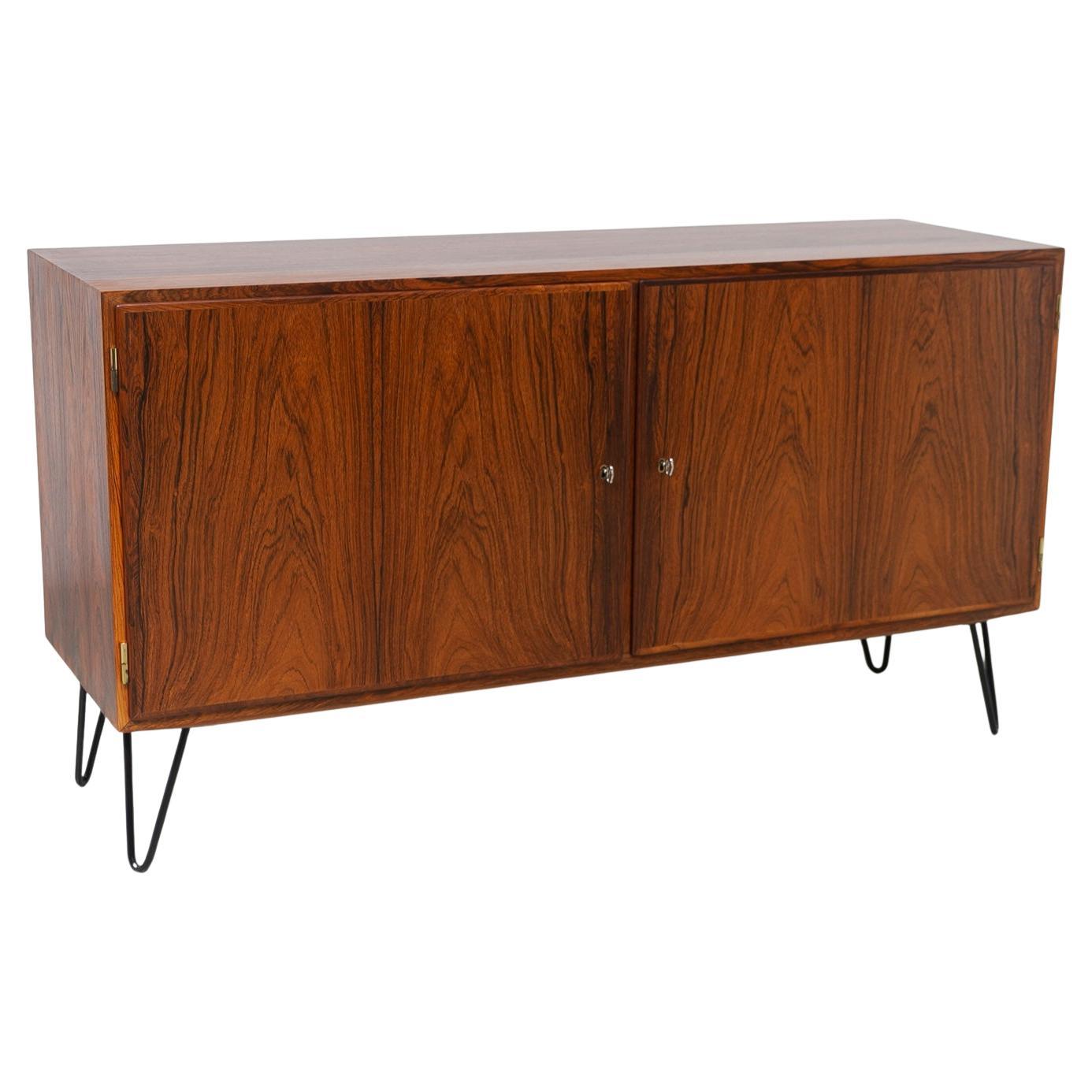 Aparador danés de palisandro de Carlo Jensen para Hundevad & Co, años 60.