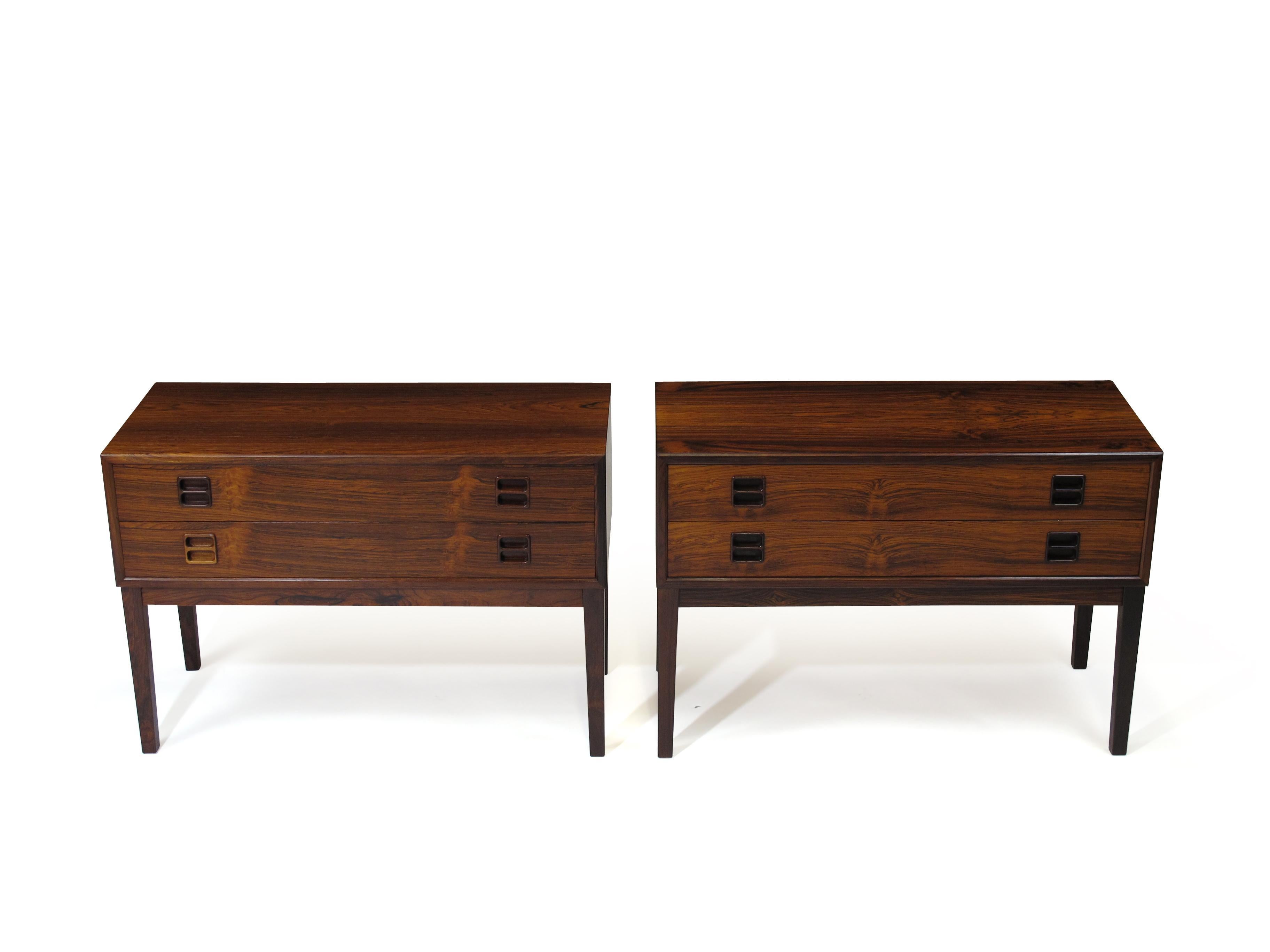Danish Brazilian Rosewood small cabinets with two drawers raised on stilted legs. The cabinets have been fully restored and in excellent condition with minor sign of age and use.

  